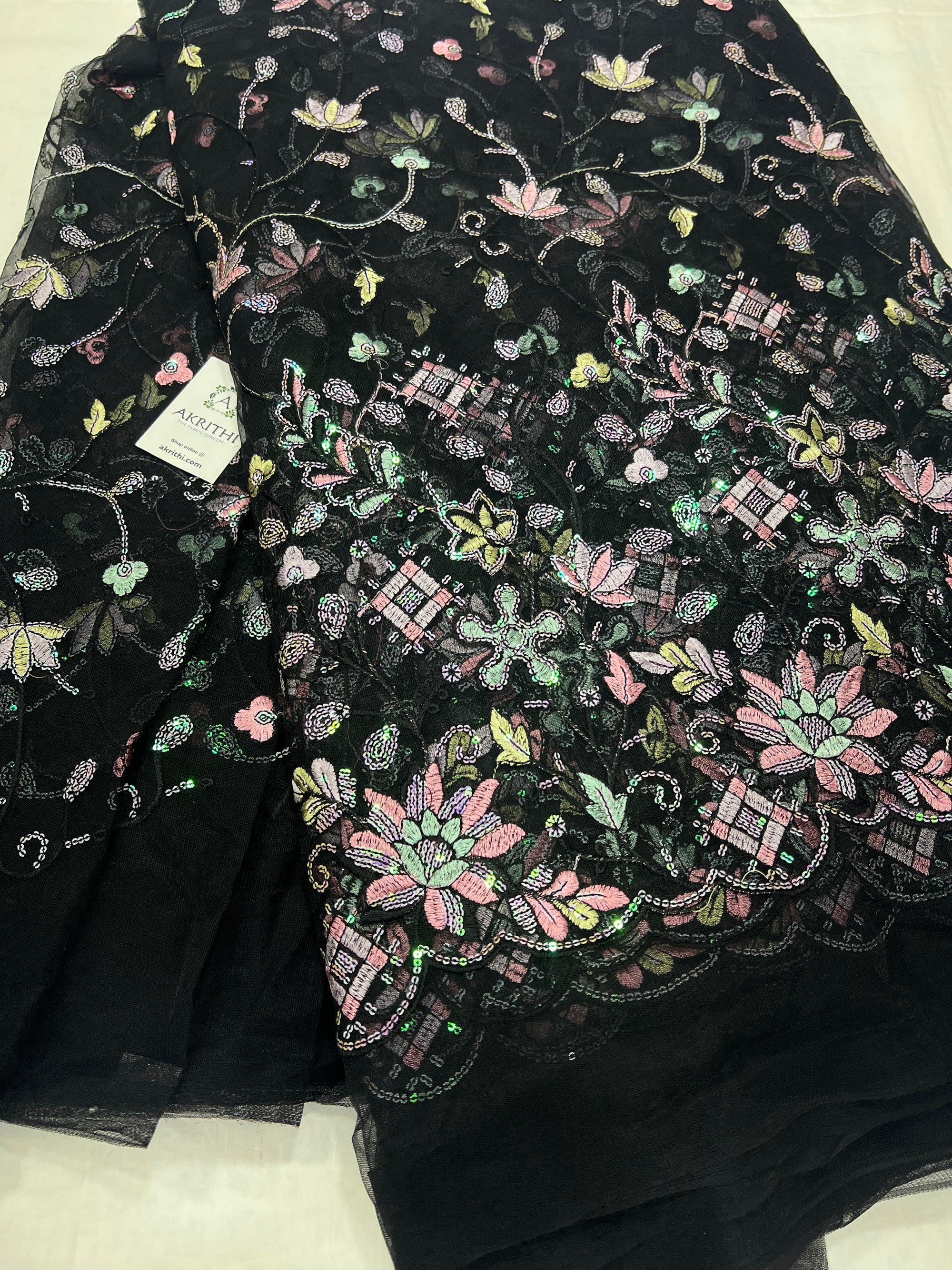 Embroidered net fabric