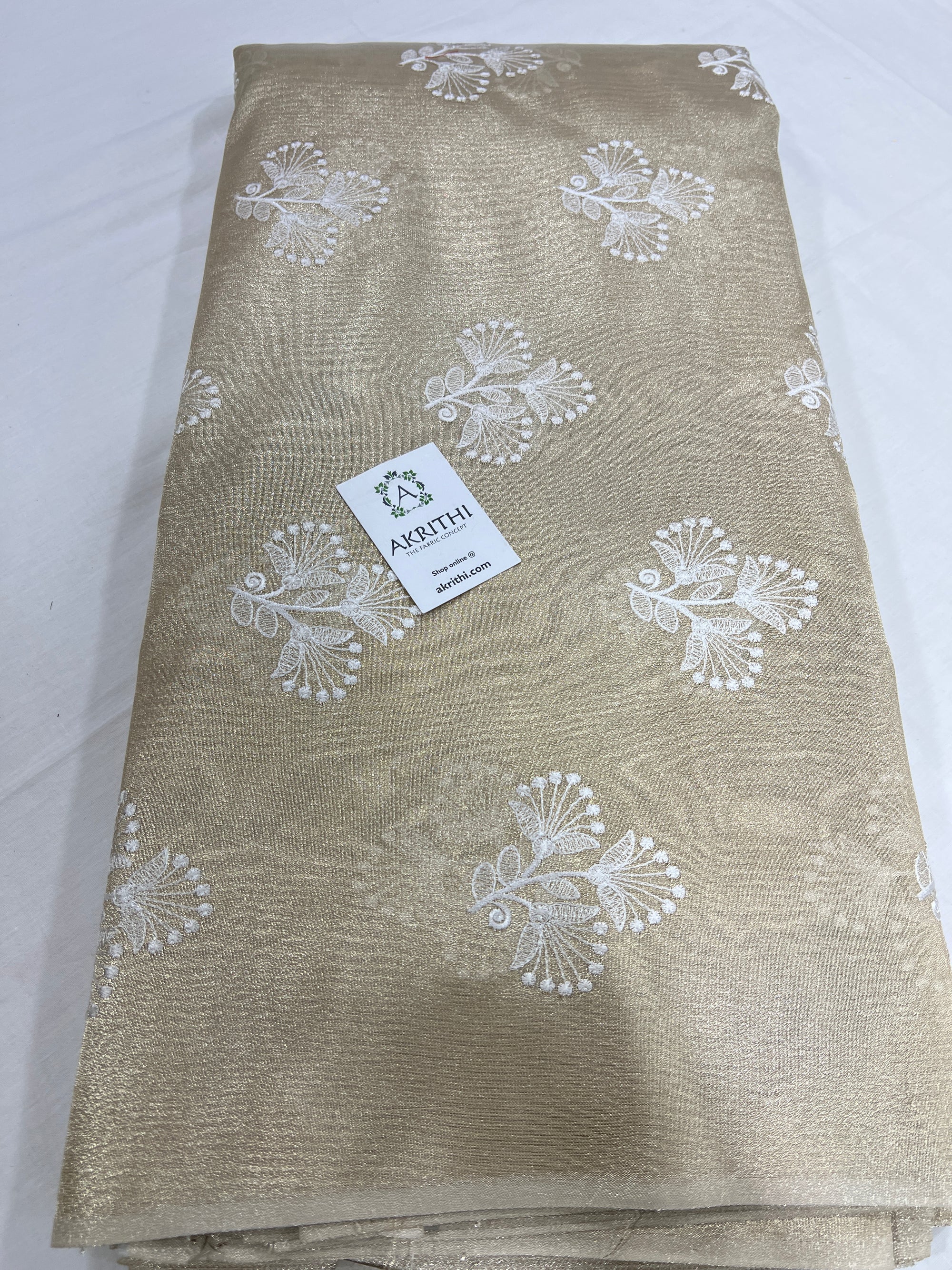 Embroidery on tissue fabric