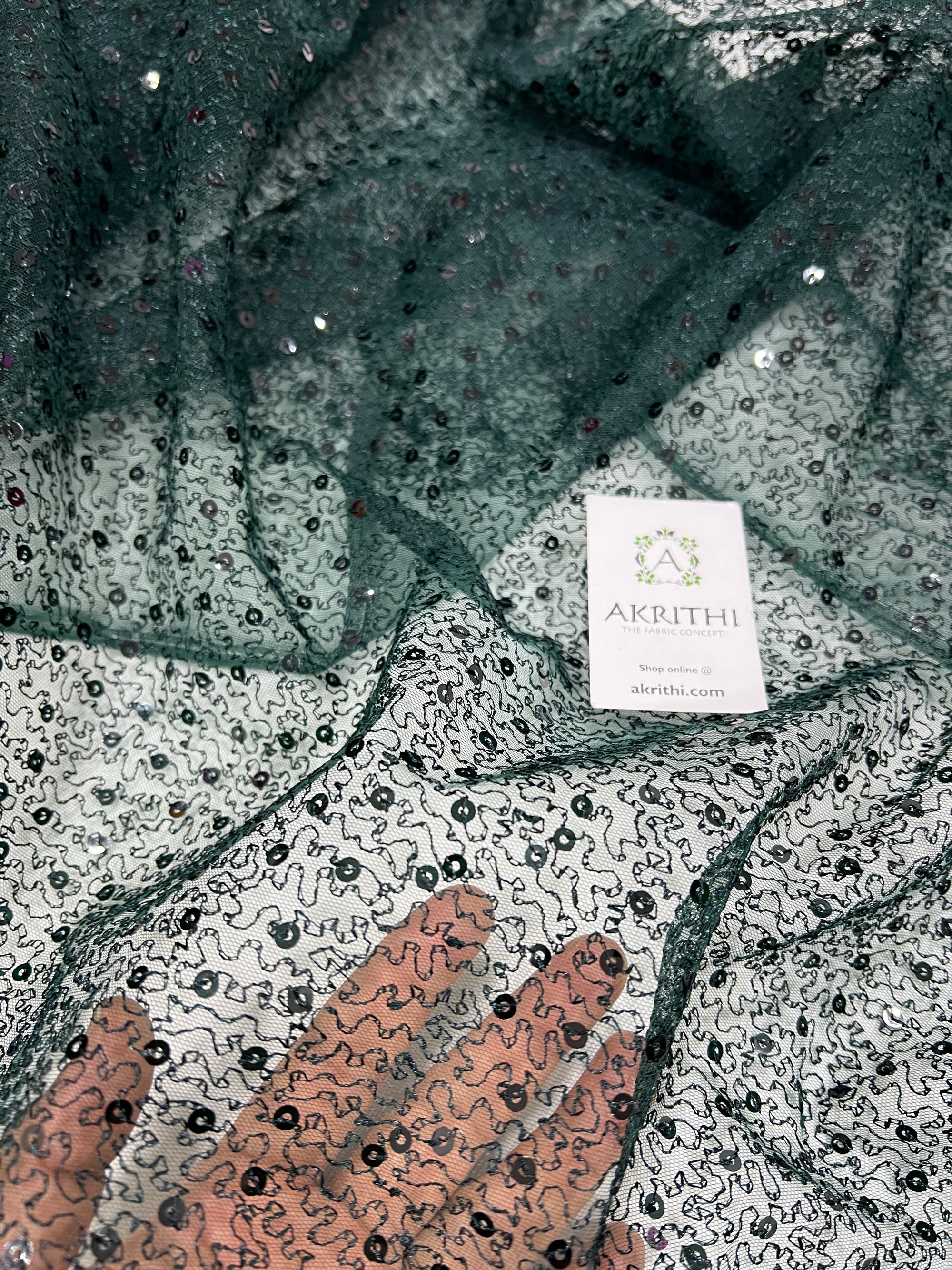 Self Embroidered net fabric