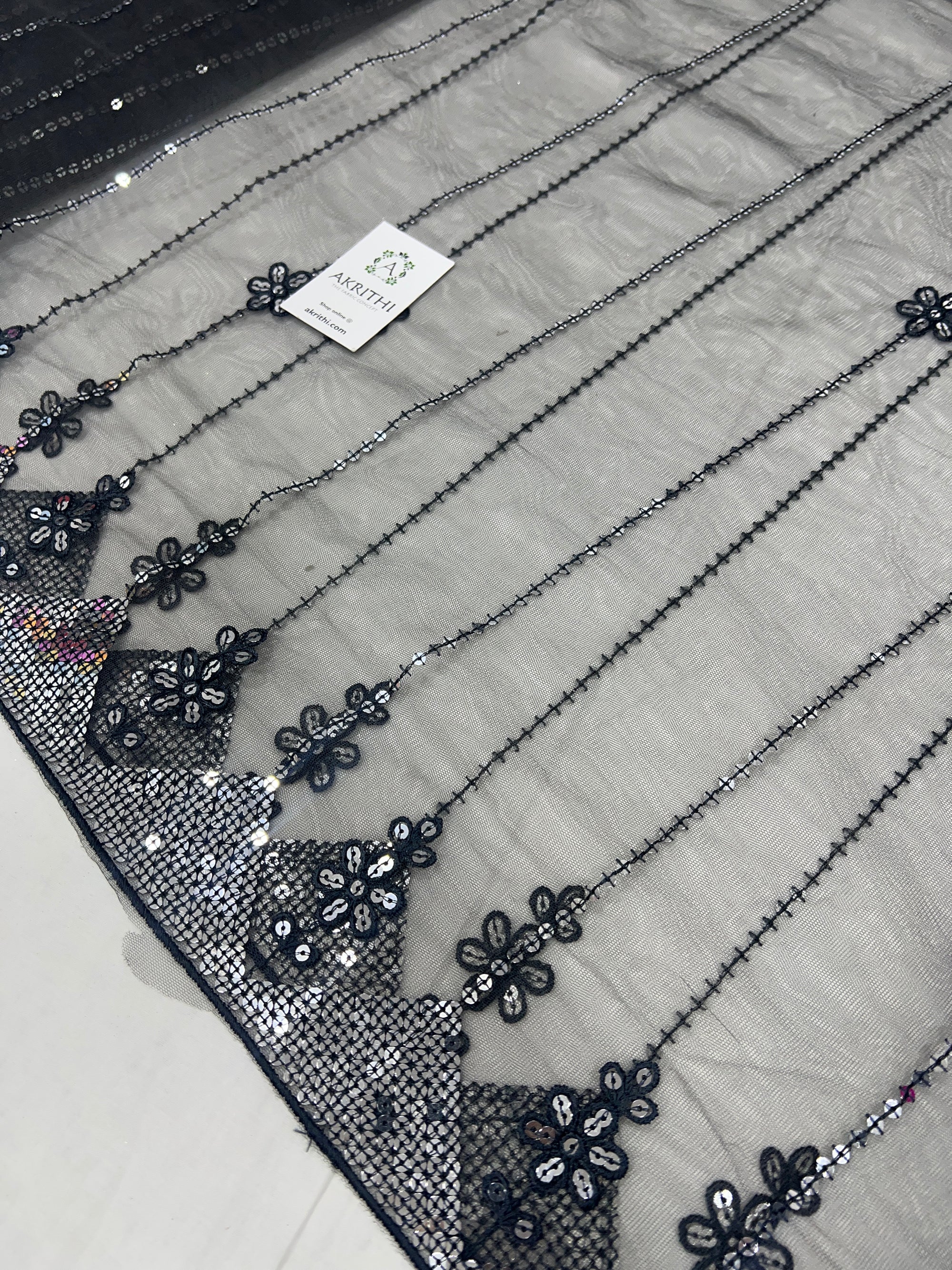 Embroidered net fabric