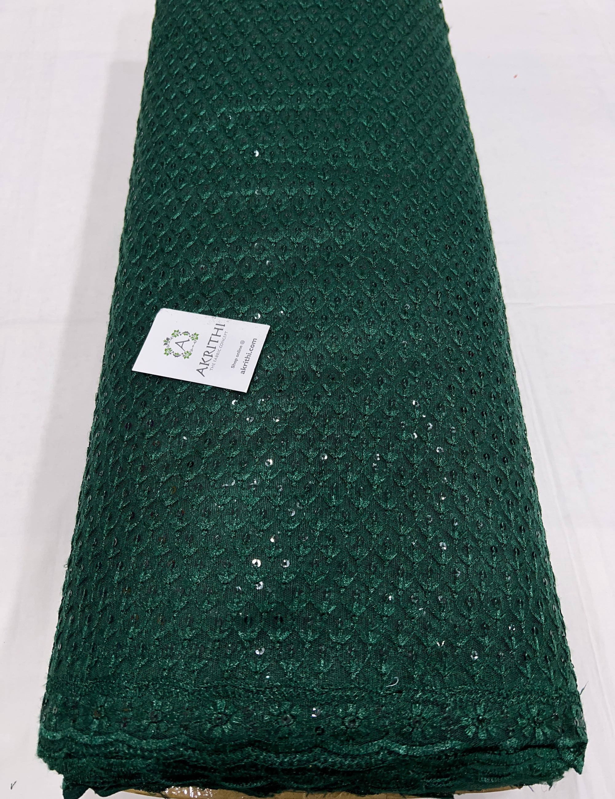 Self Embroidered net fabric