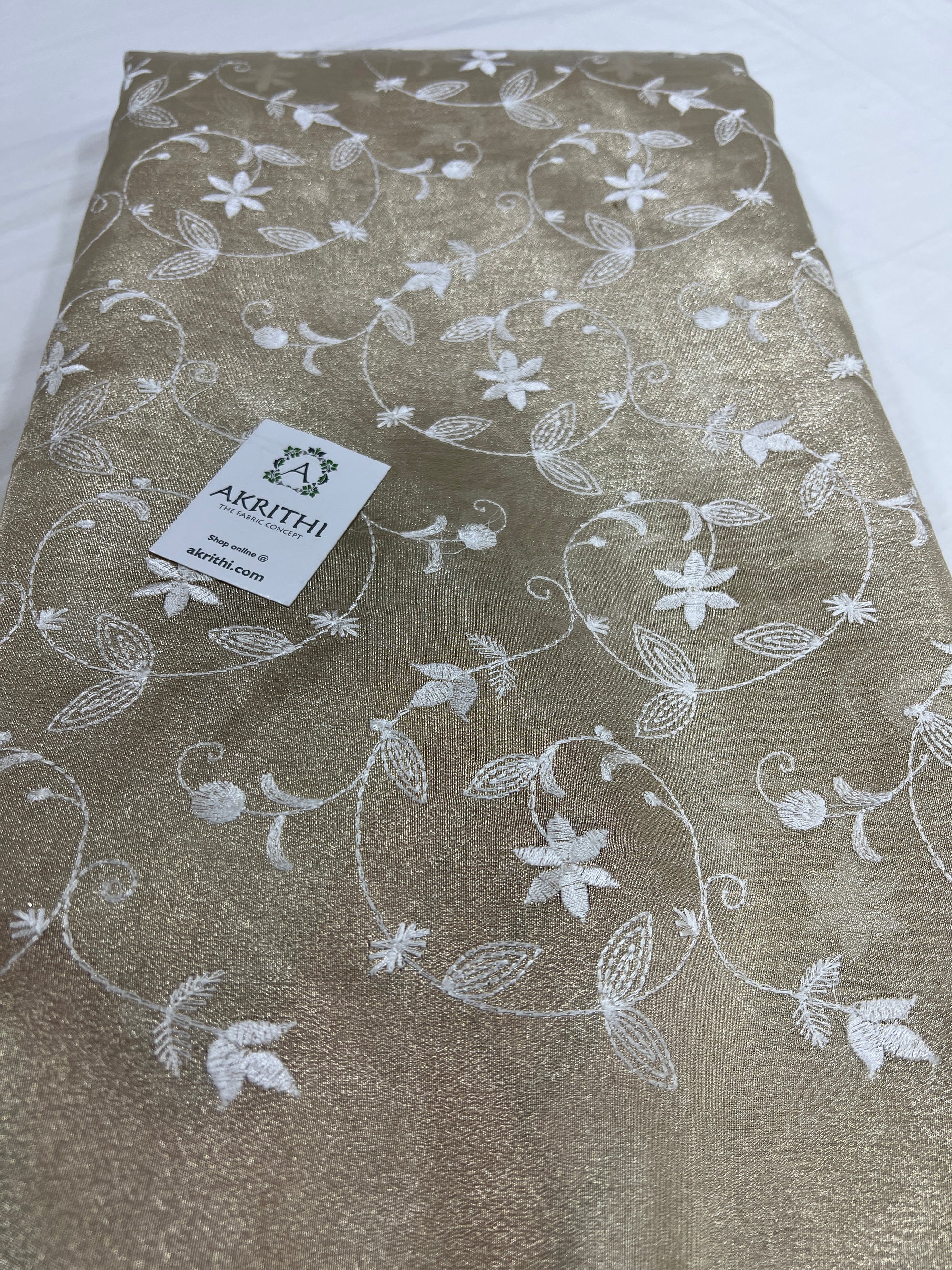 Embroidery on tissue fabric