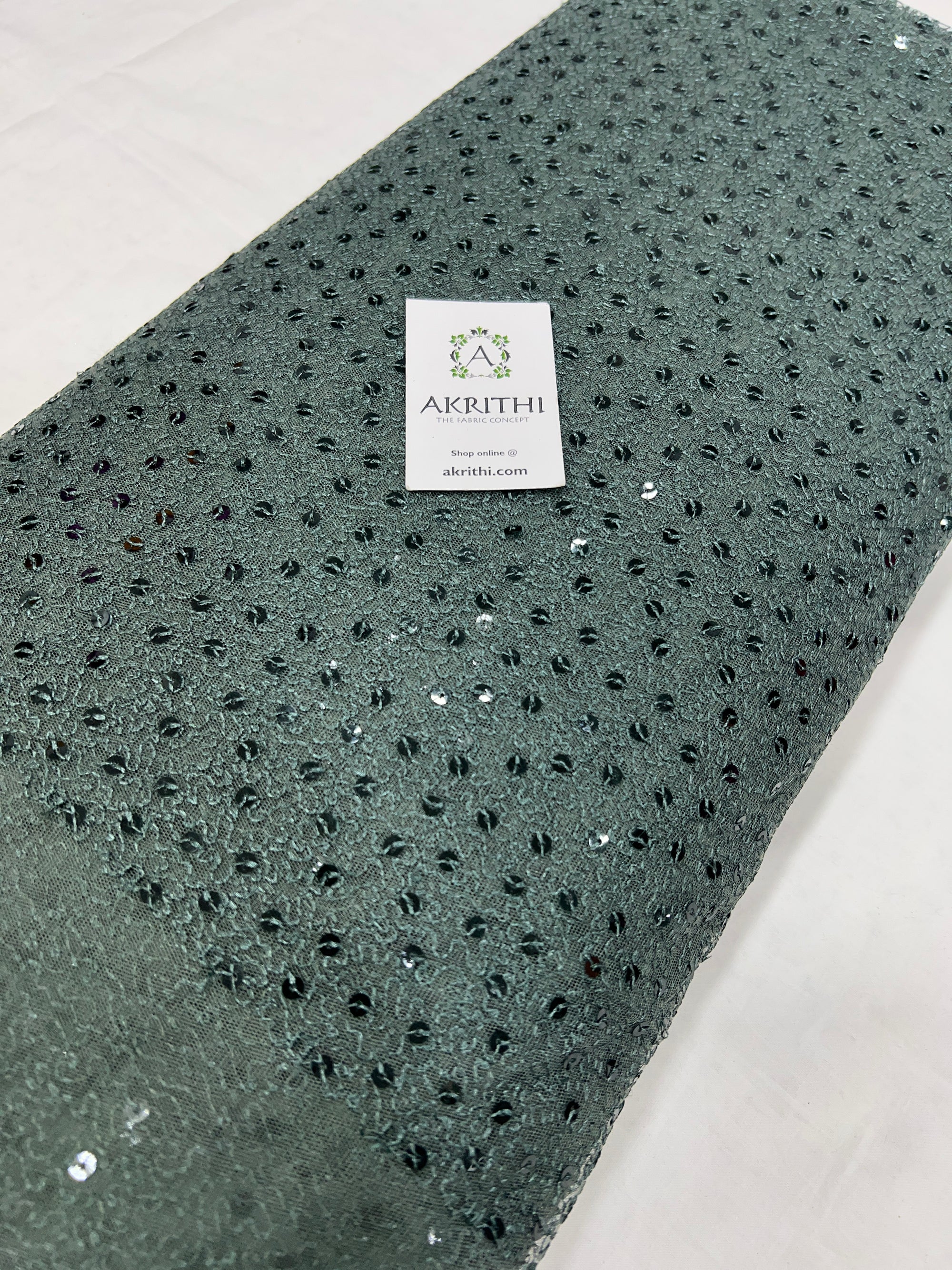 Self Embroidered net fabric