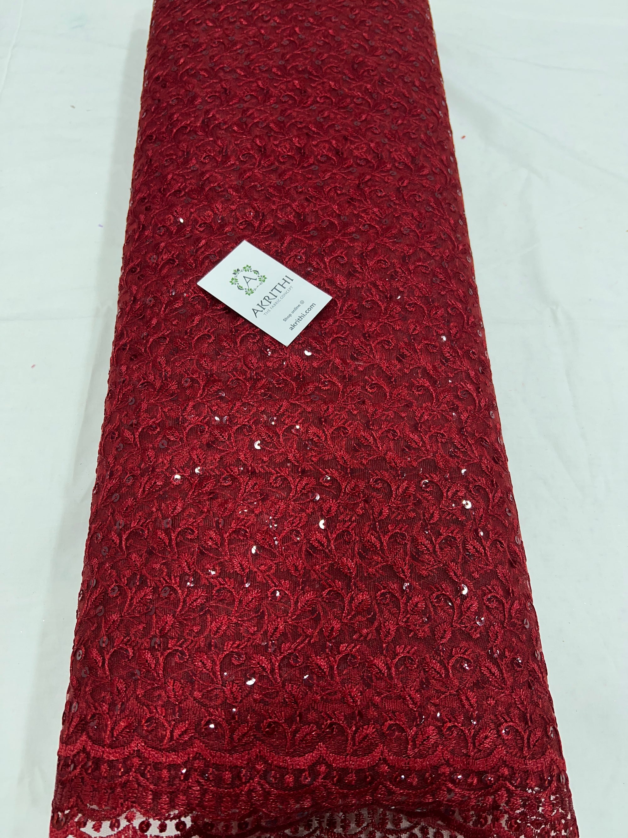 Self Embroidered net fabric