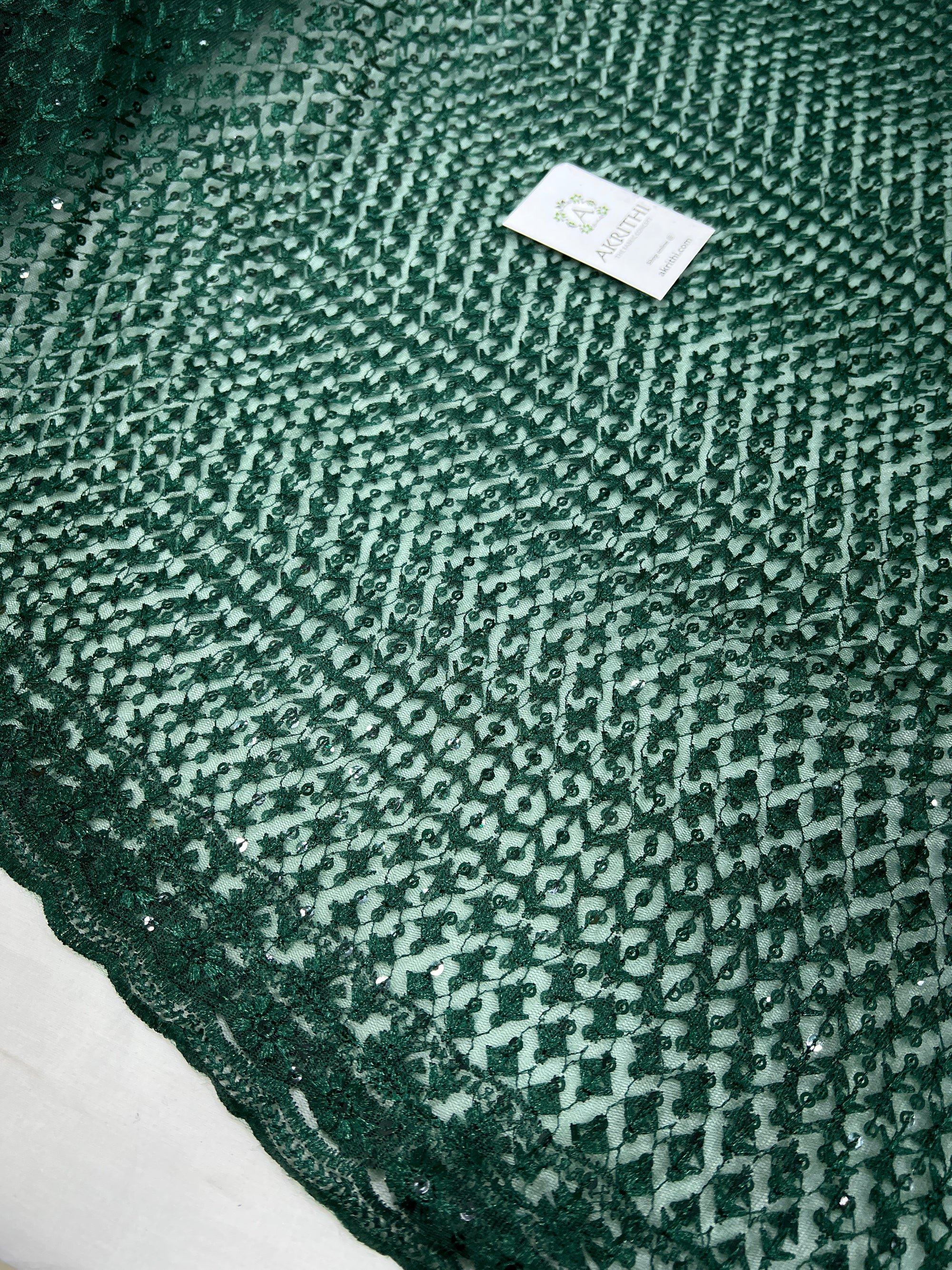 Self Embroidered net fabric