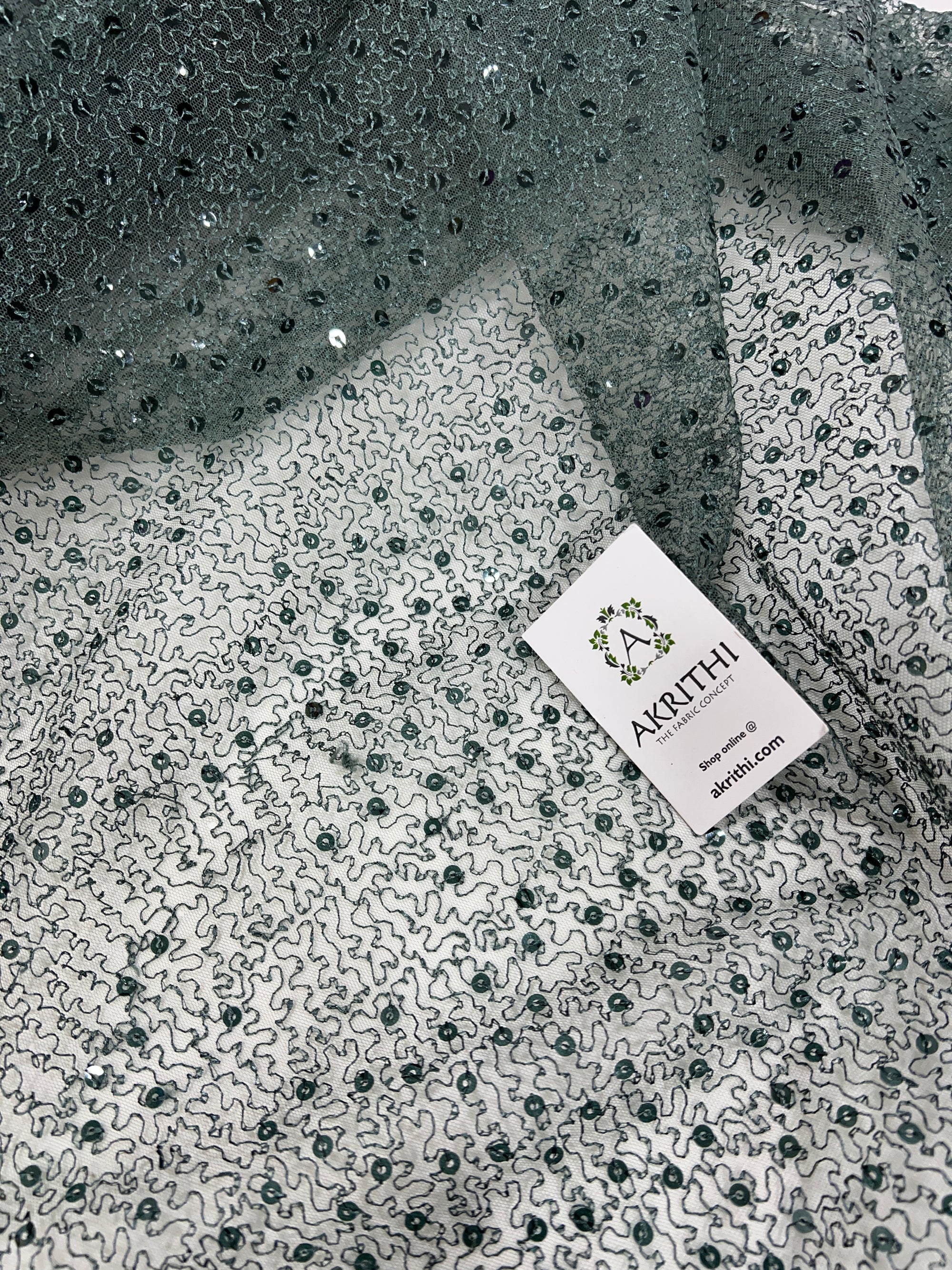 Self Embroidered net fabric