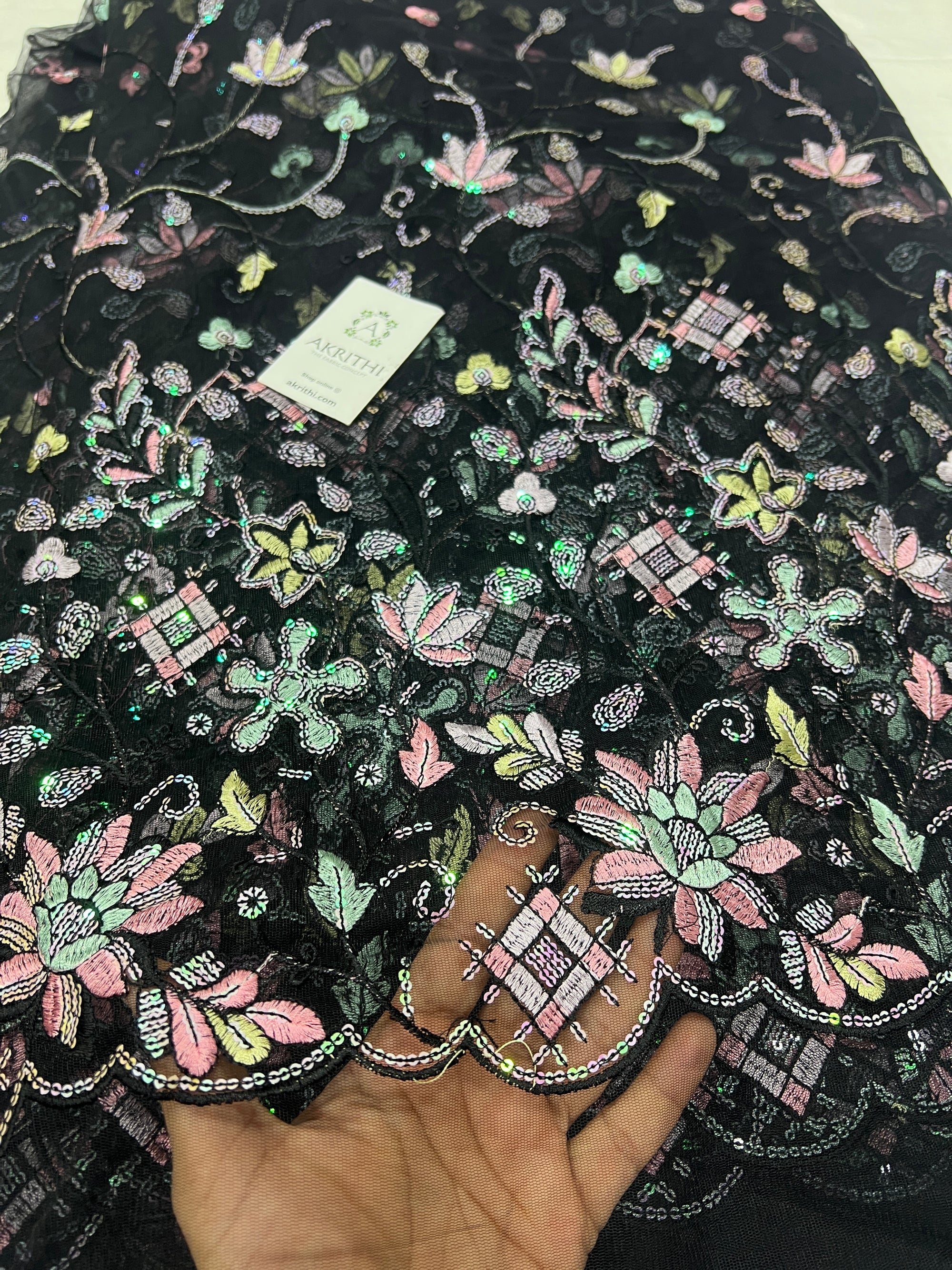 Embroidered net fabric