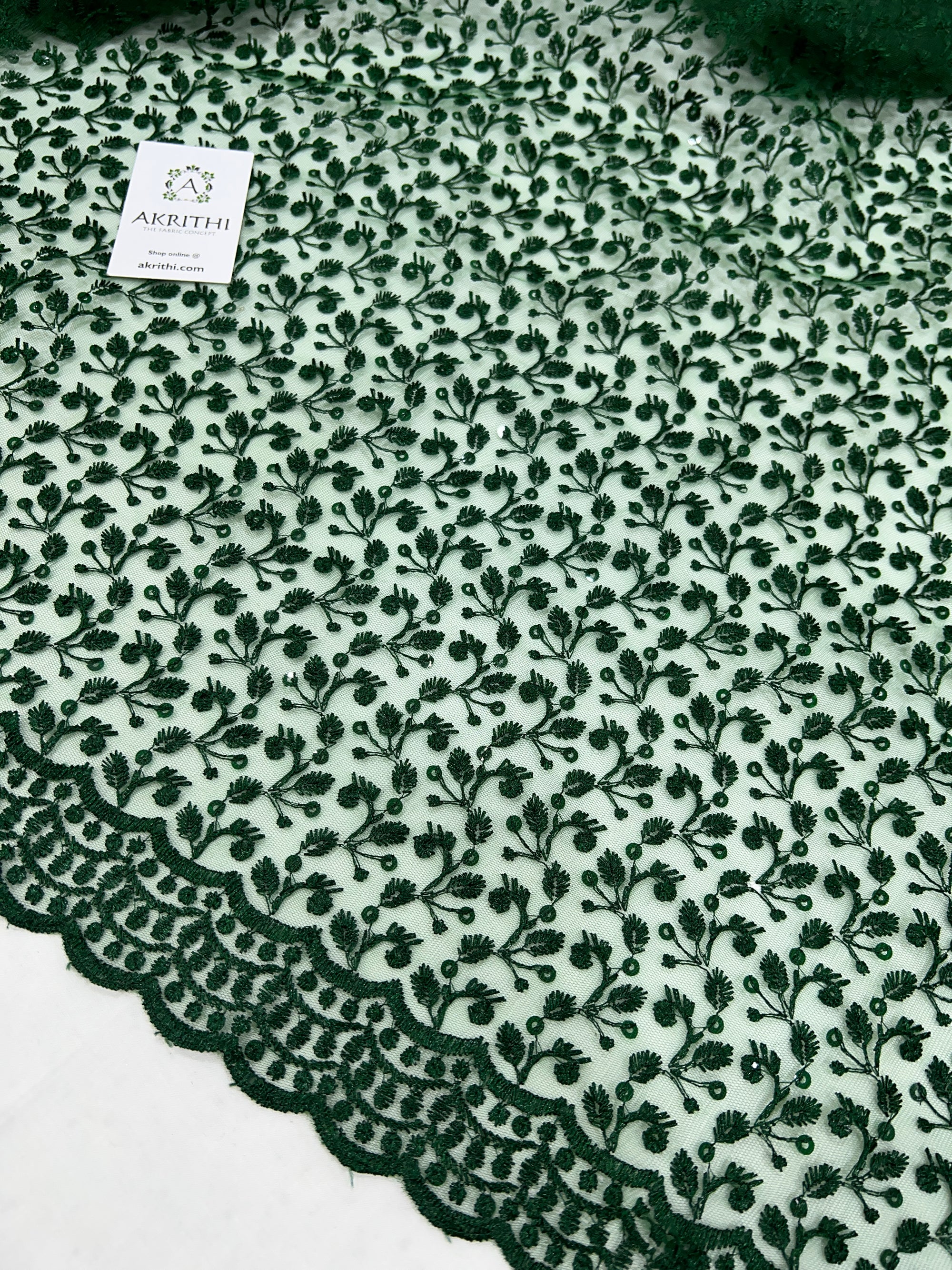 Self Embroidered net fabric