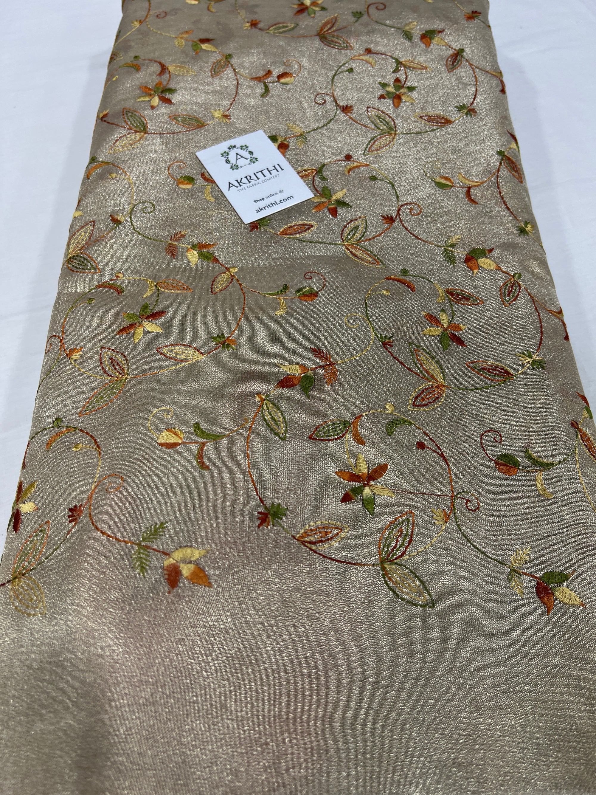 Embroidery on tissue fabric
