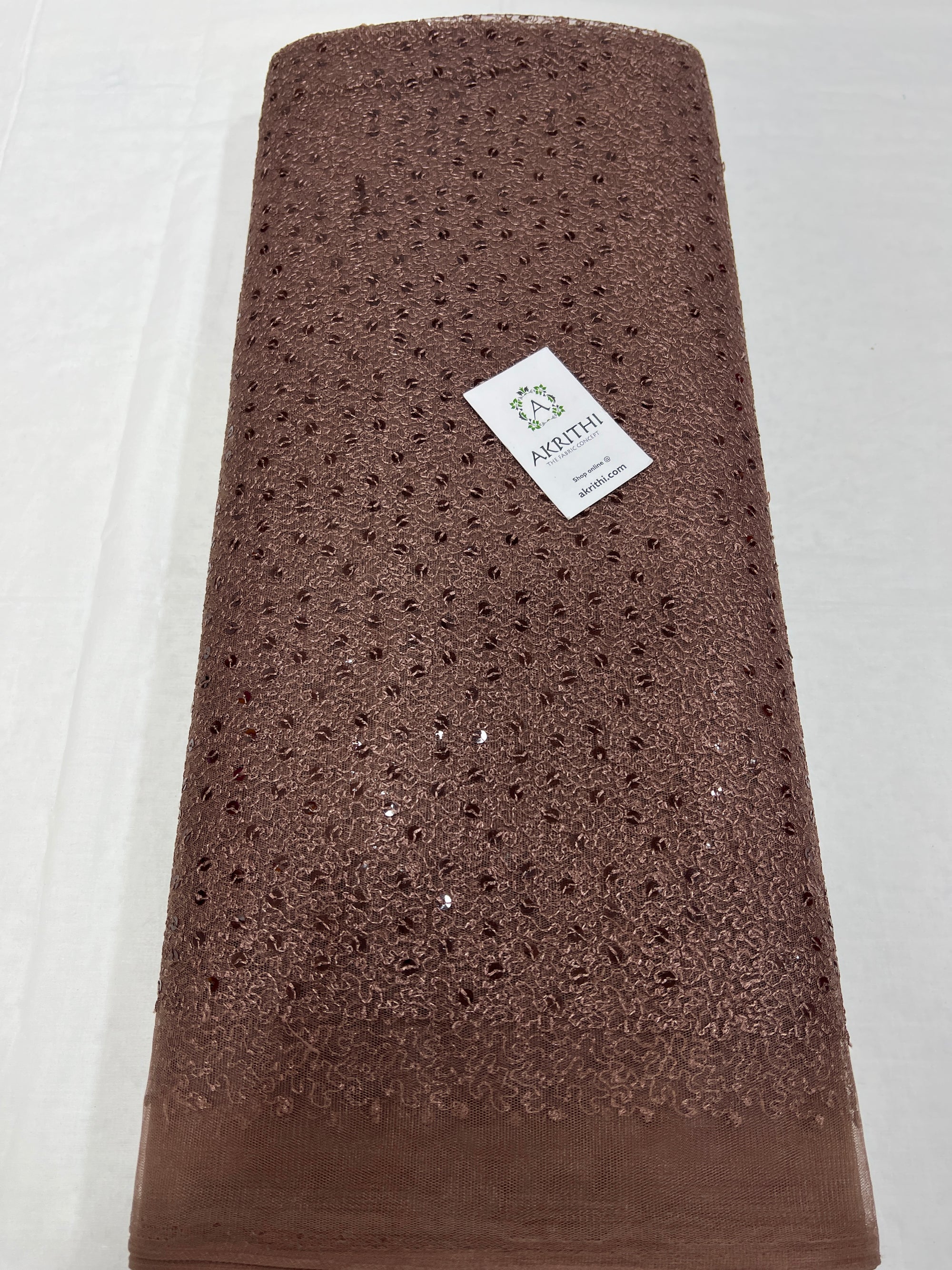 Self Embroidered net fabric