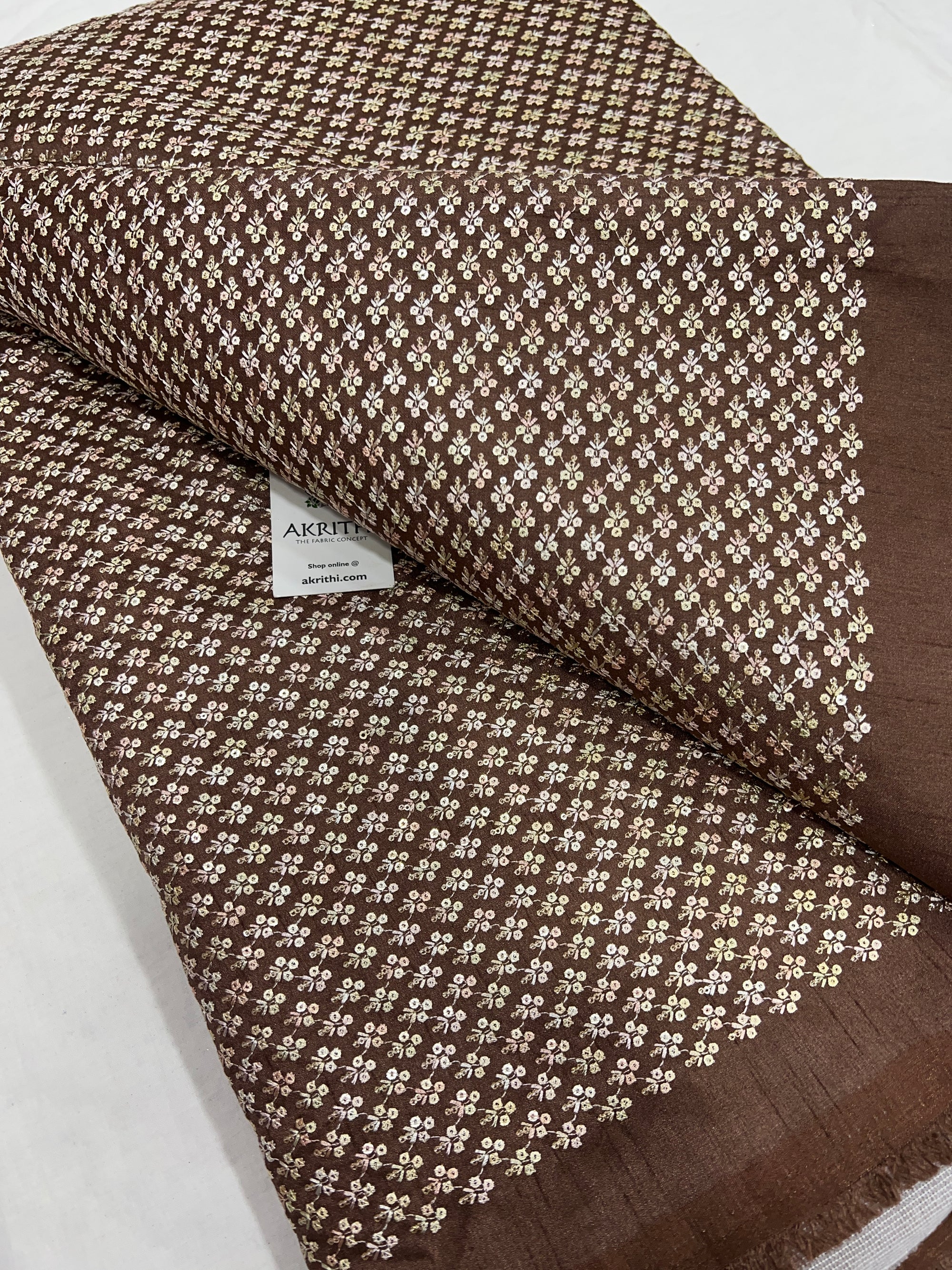 Embroidered raw silk fabric