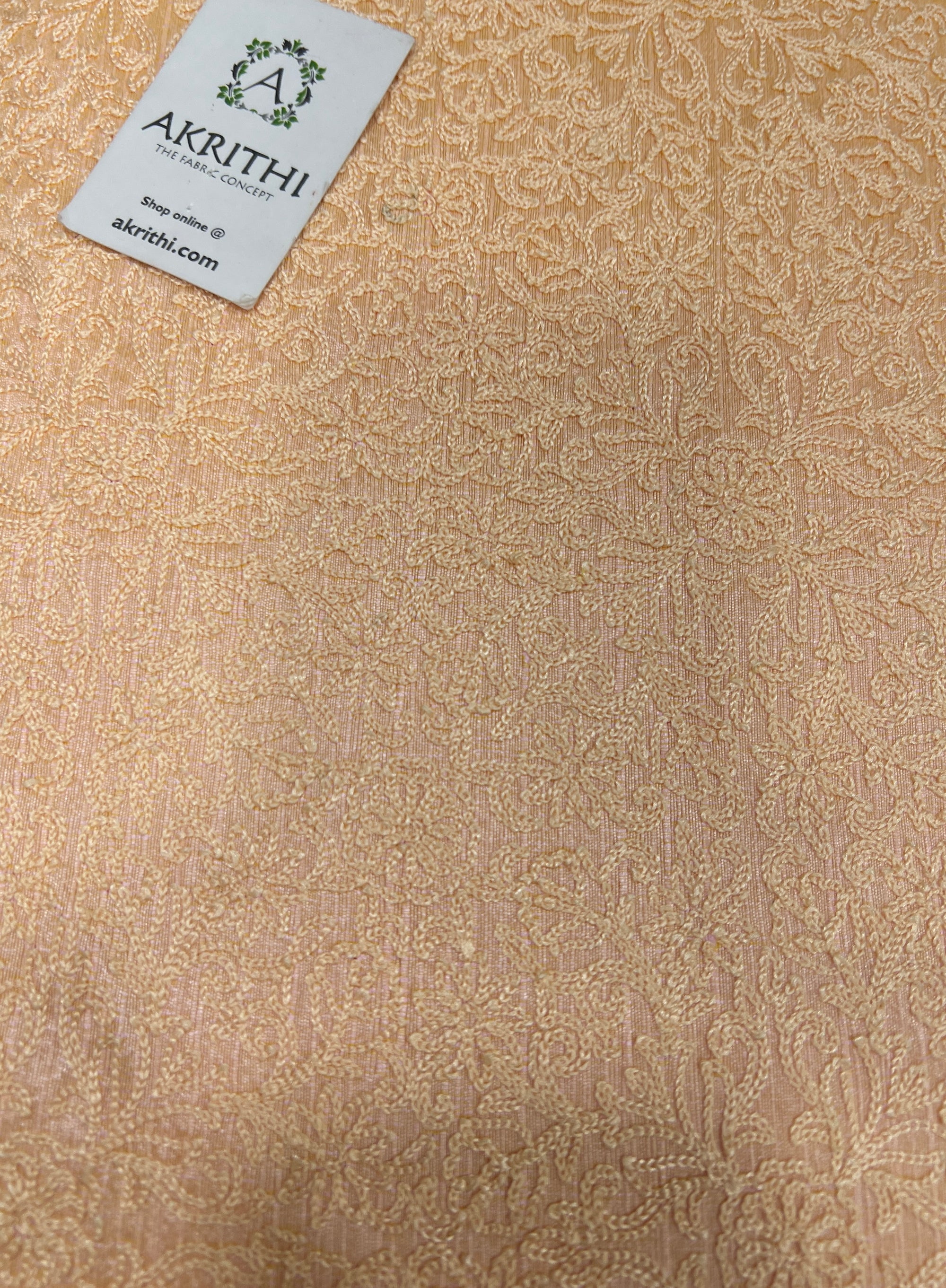 Embroidered raw silk fabric