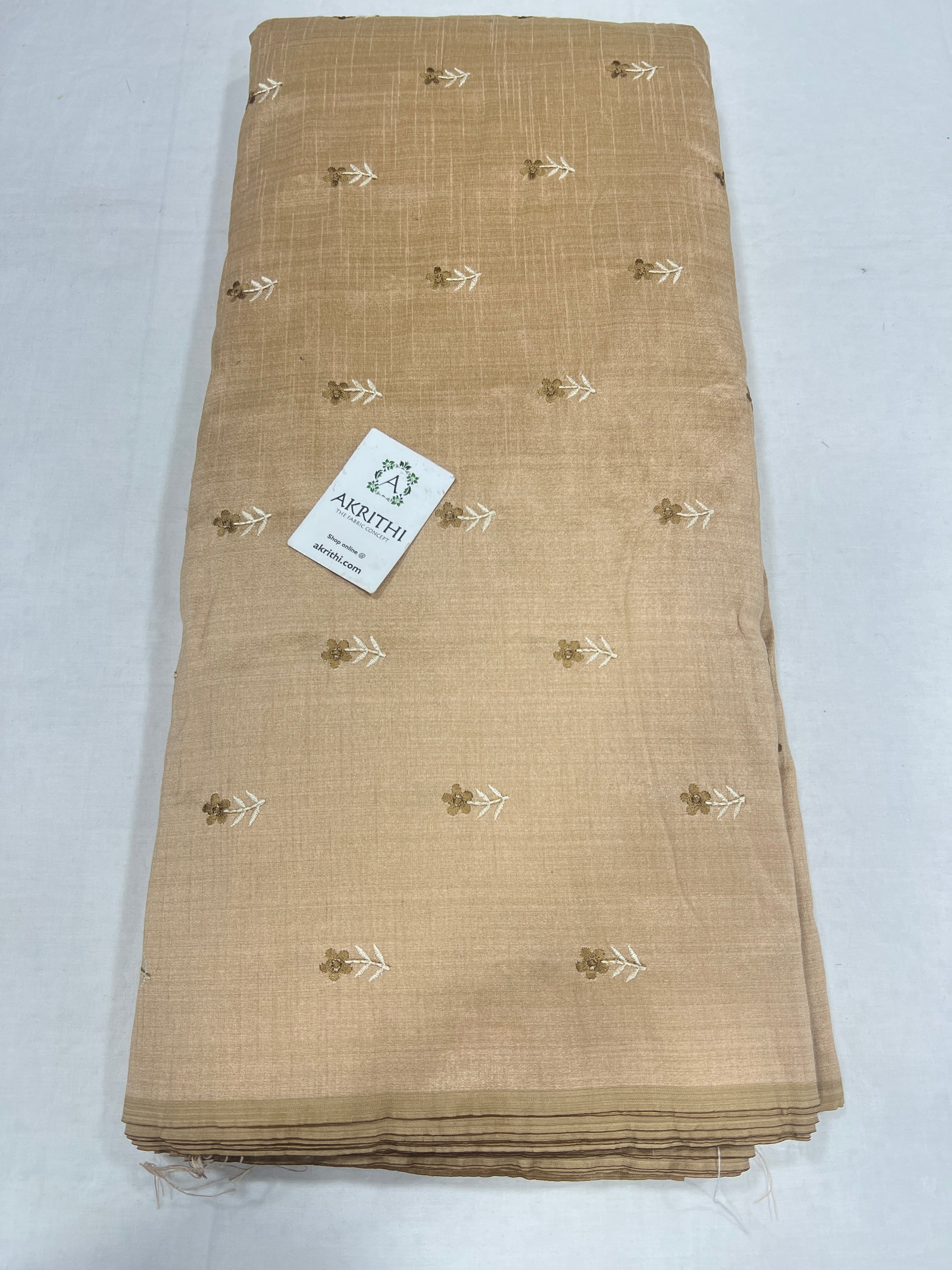 Embroidered raw silk fabric