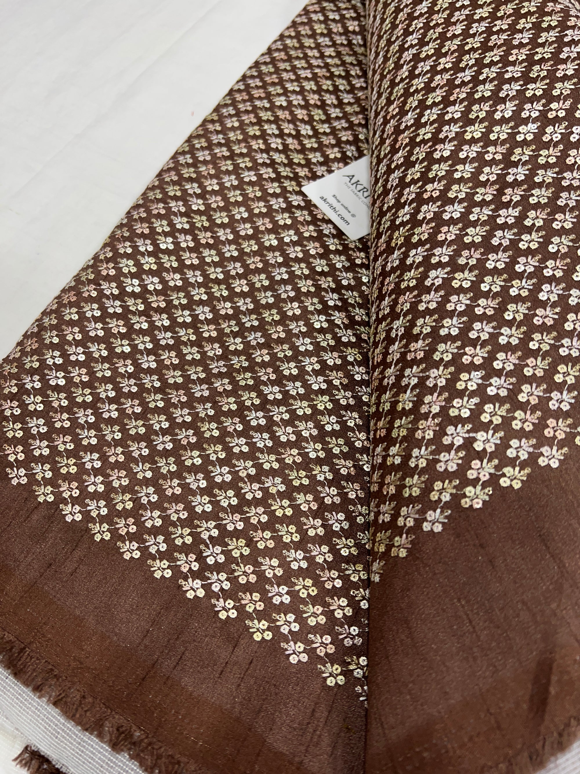 Embroidered raw silk fabric