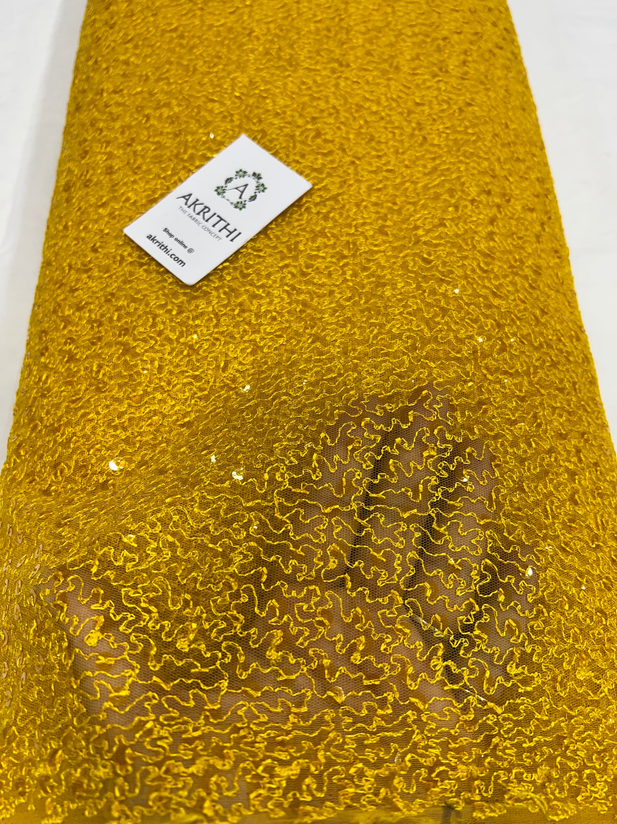 Self Embroidered net fabric