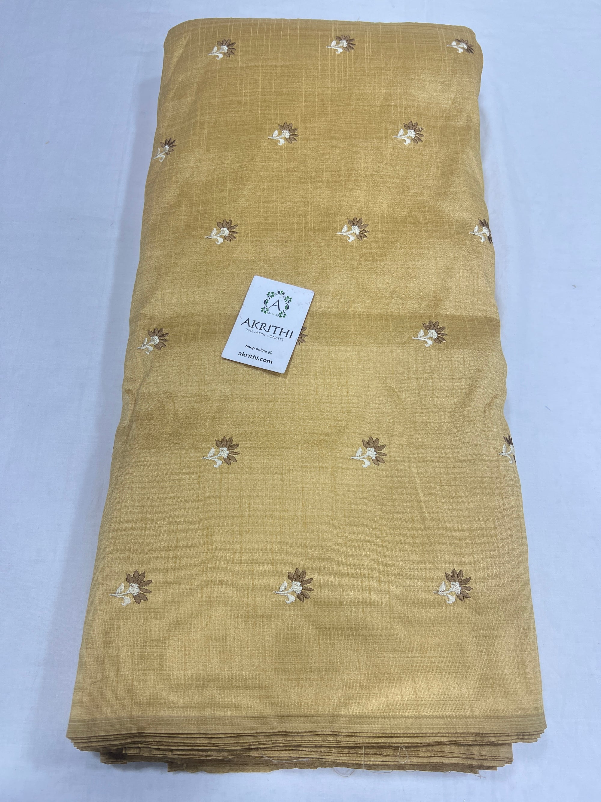 Embroidered raw silk fabric