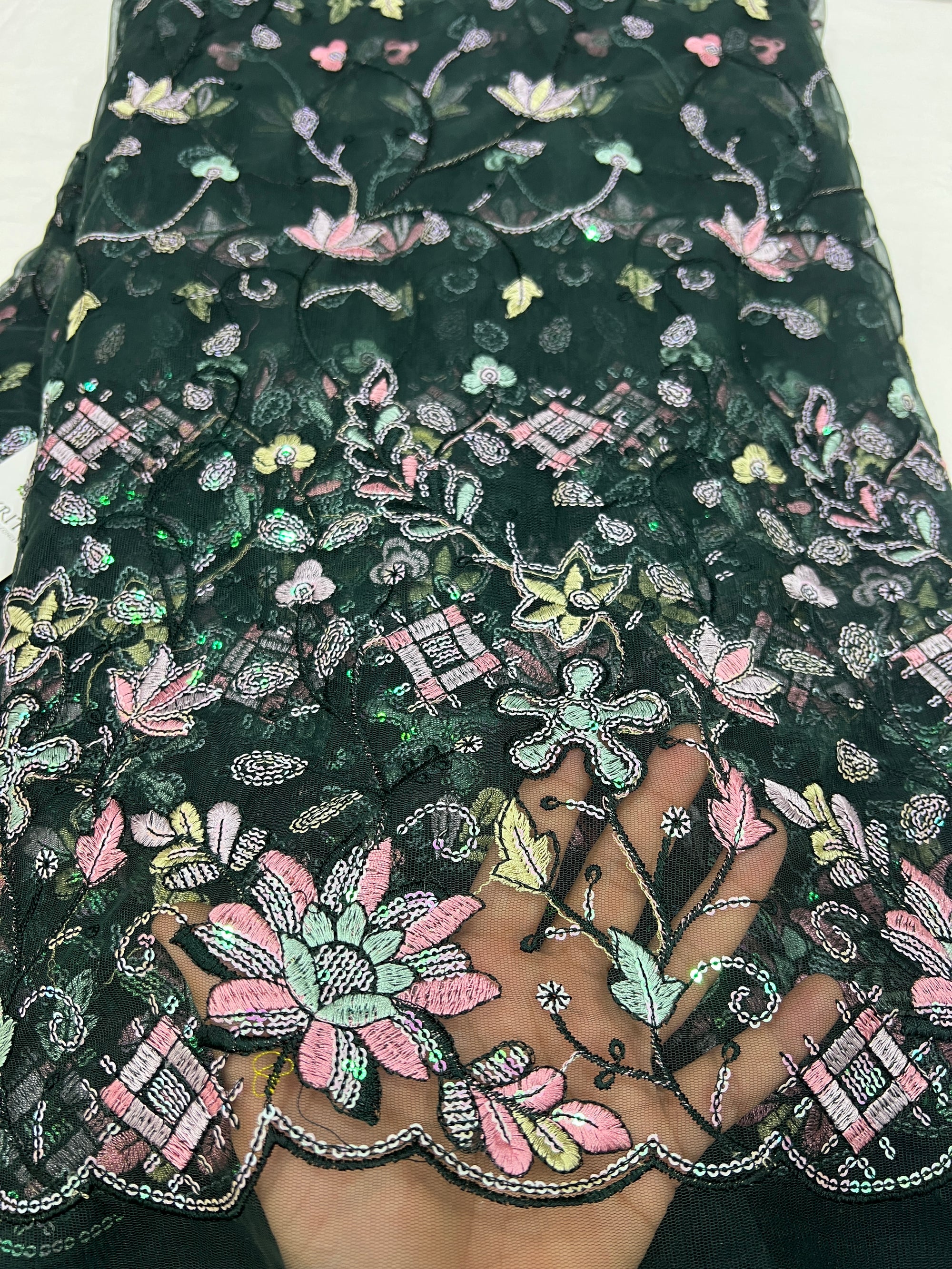 Embroidered net fabric