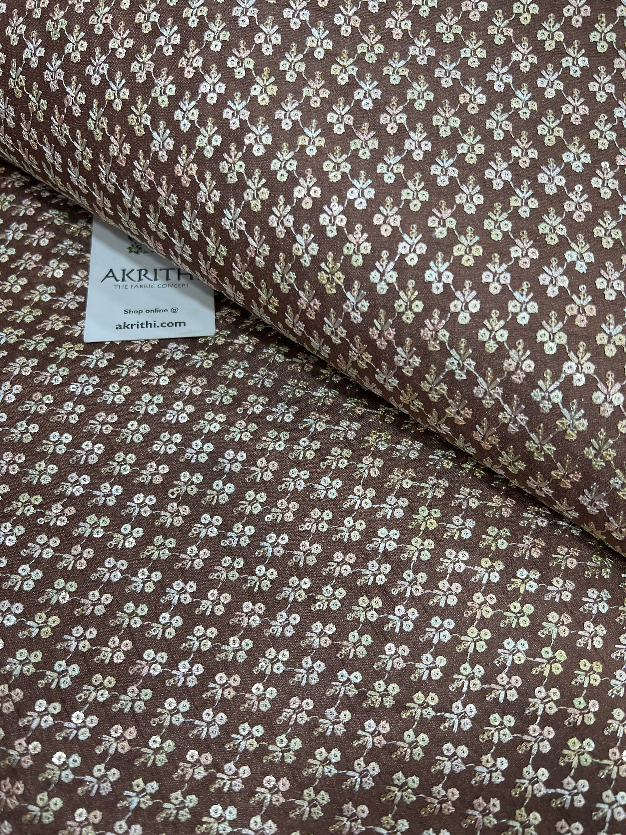 Embroidered raw silk fabric