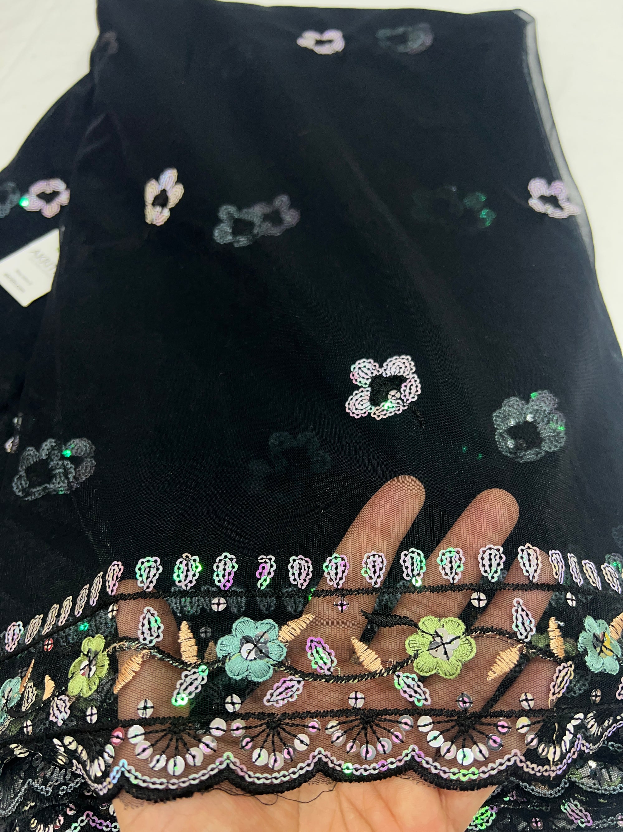 Embroidered net fabric