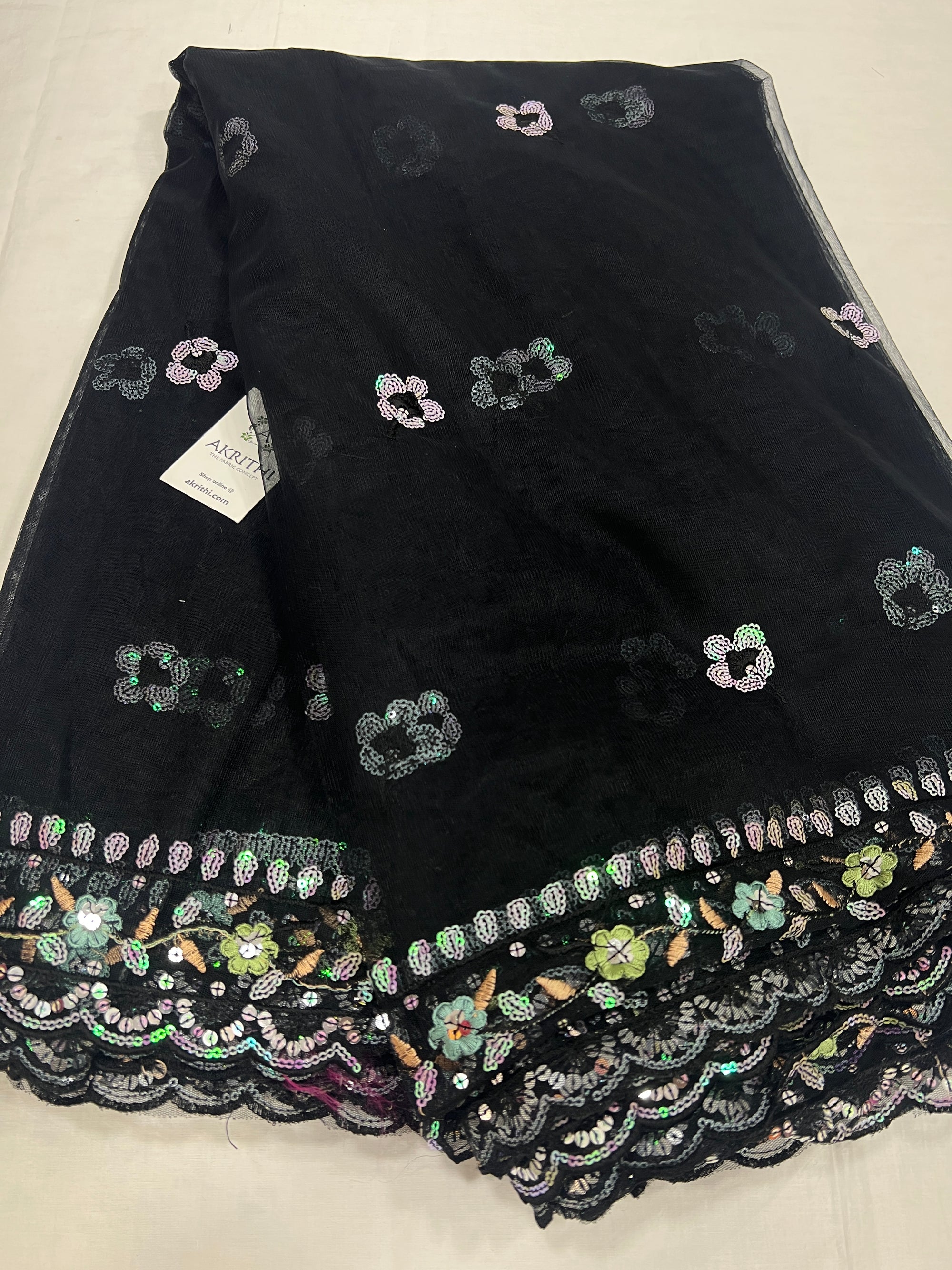 Embroidered net fabric