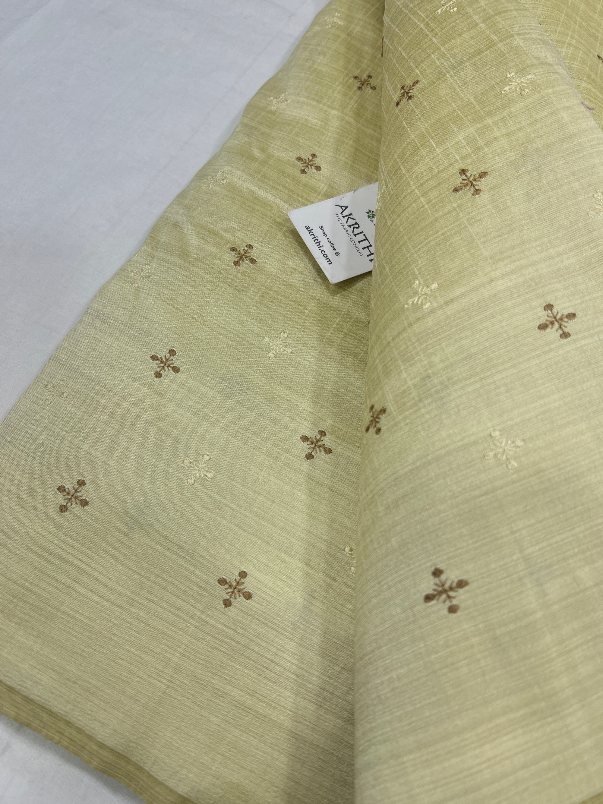 Embroidered raw silk fabric