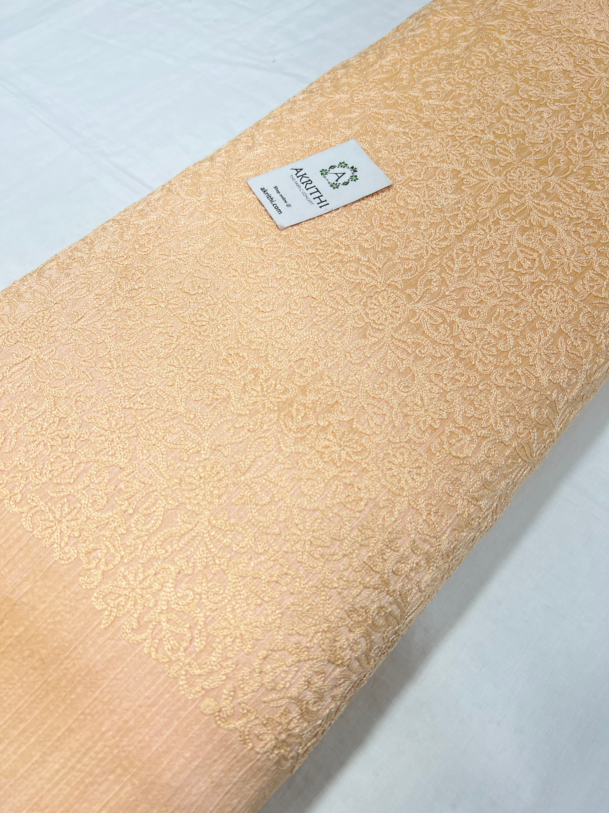 Embroidered raw silk fabric