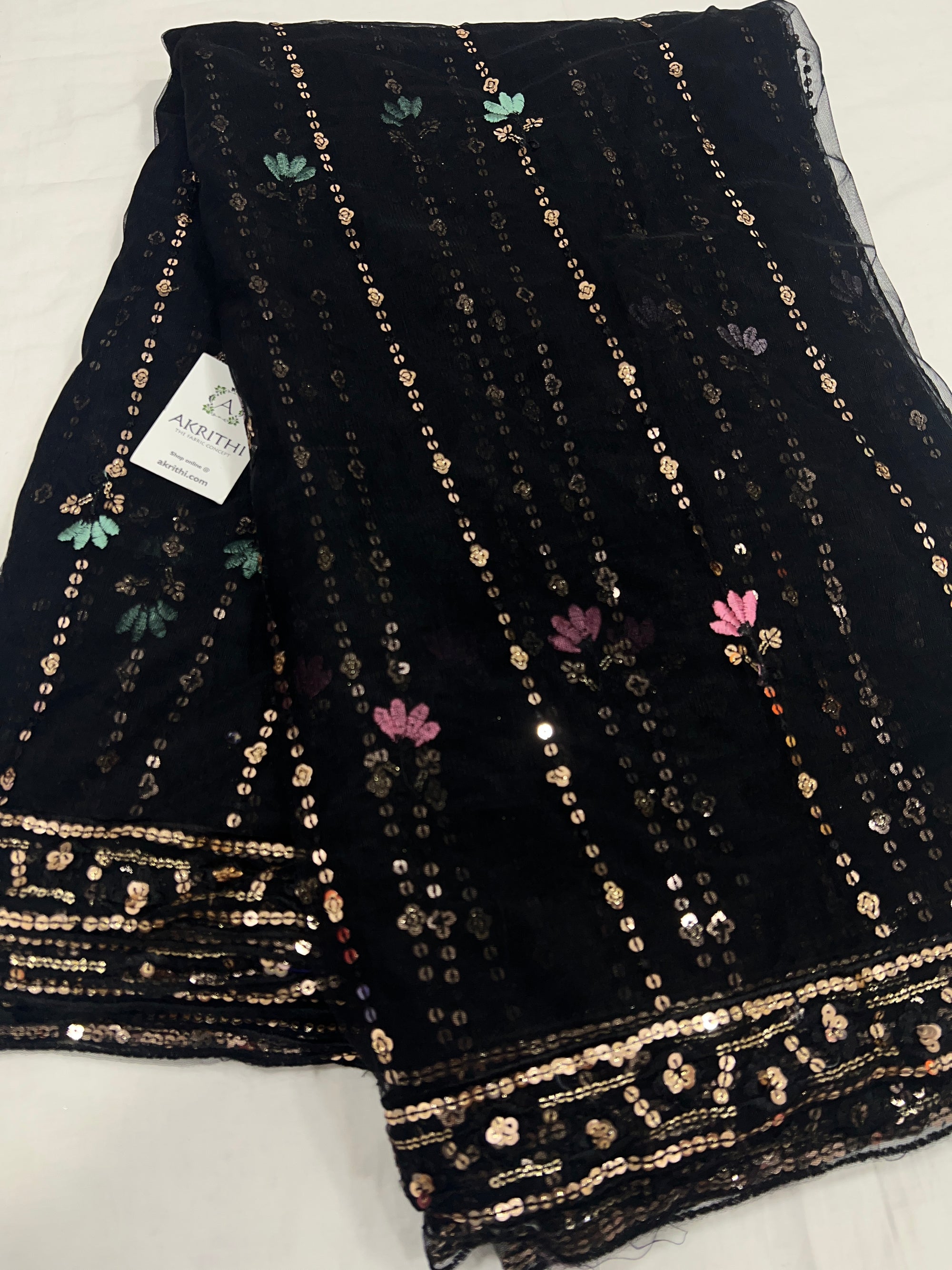 Embroidered net fabric