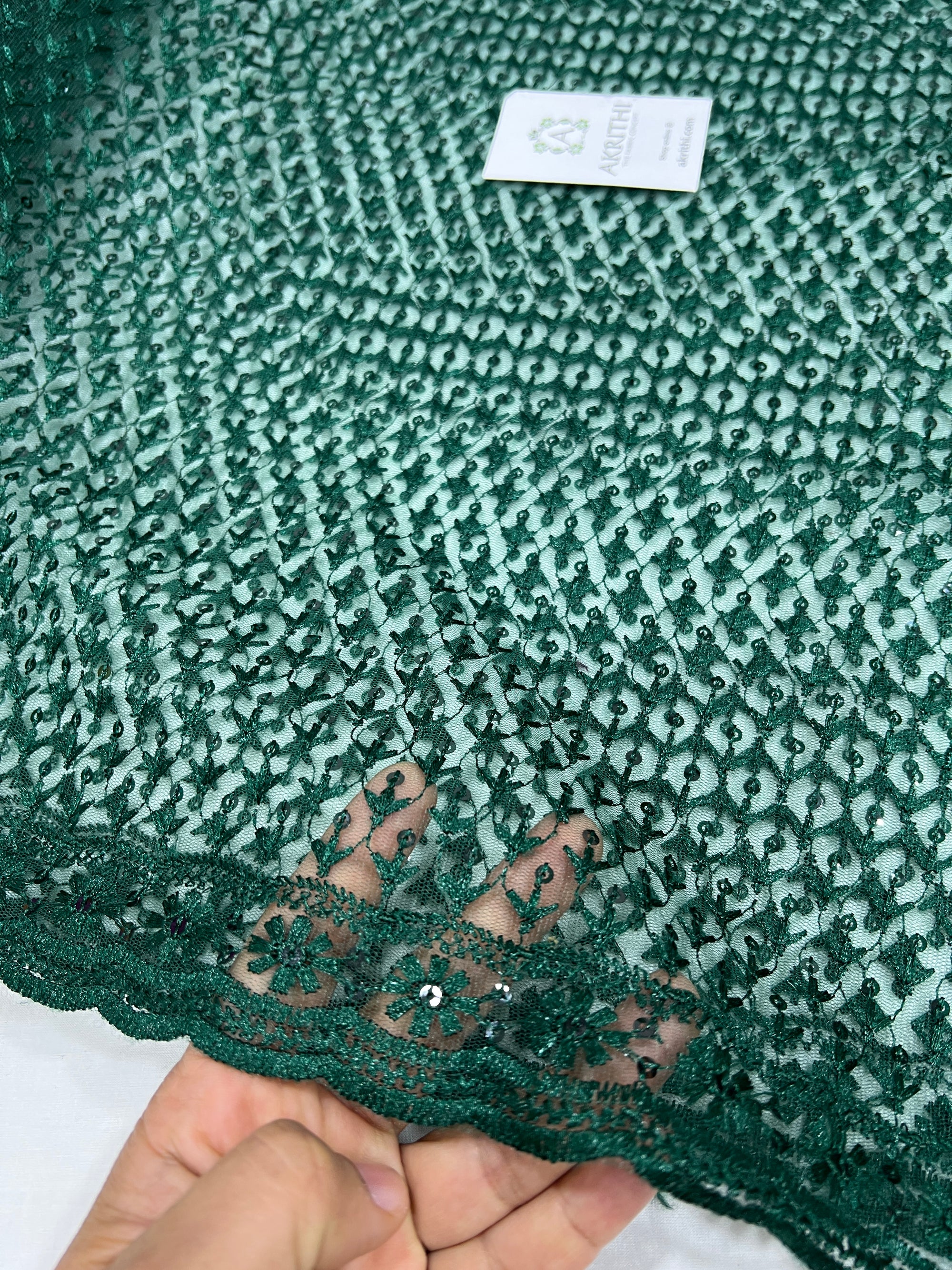 Self Embroidered net fabric