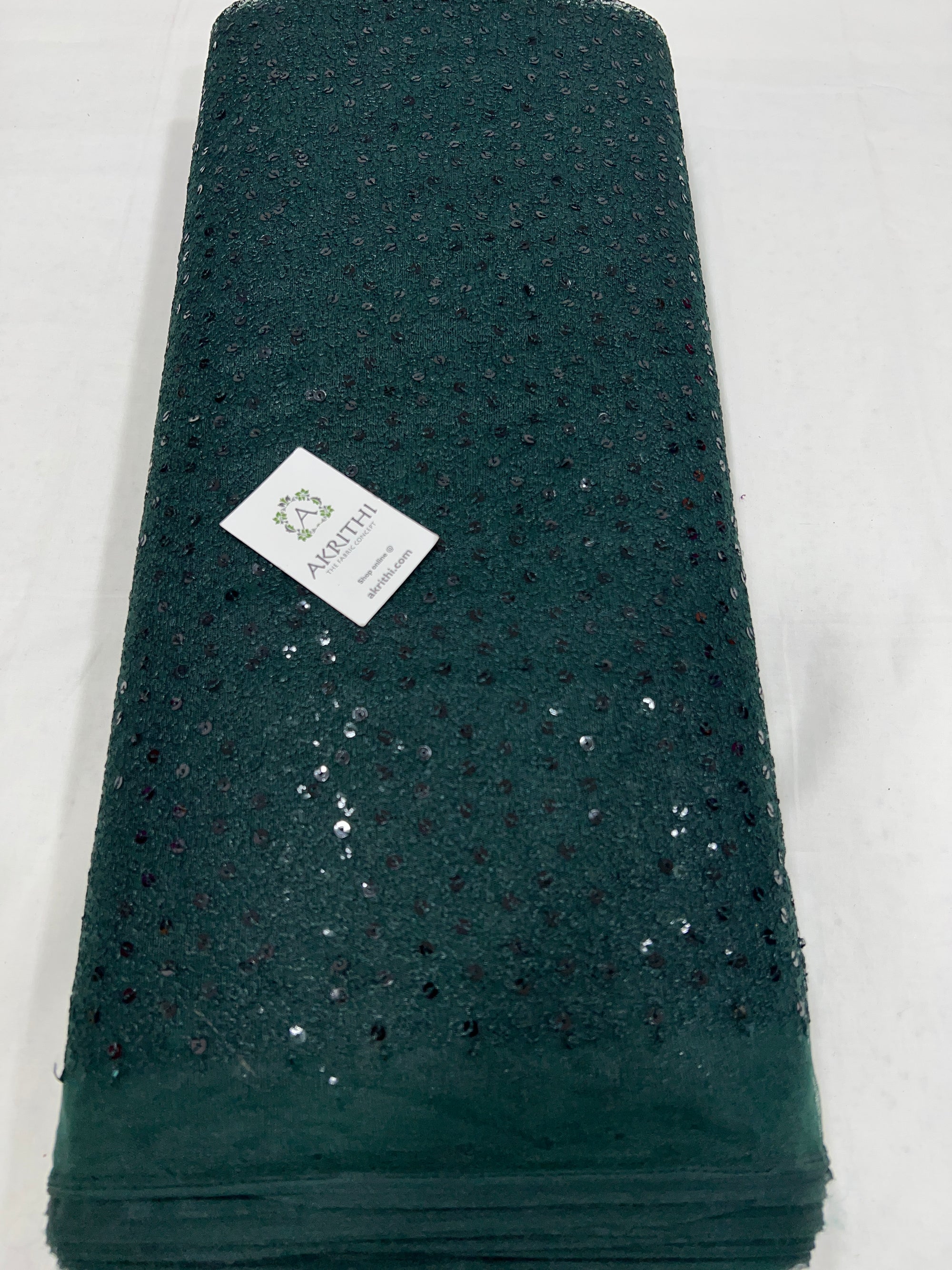 Self Embroidered net fabric