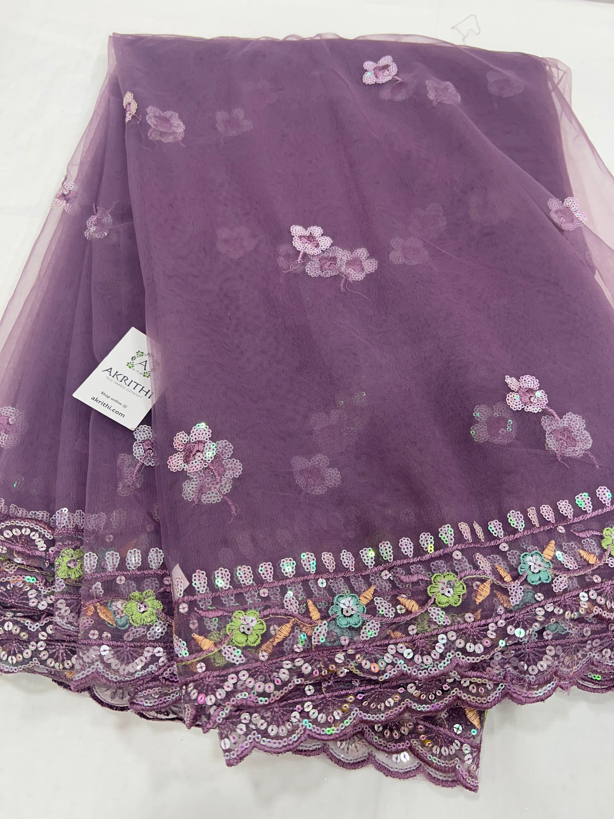 Embroidered net fabric