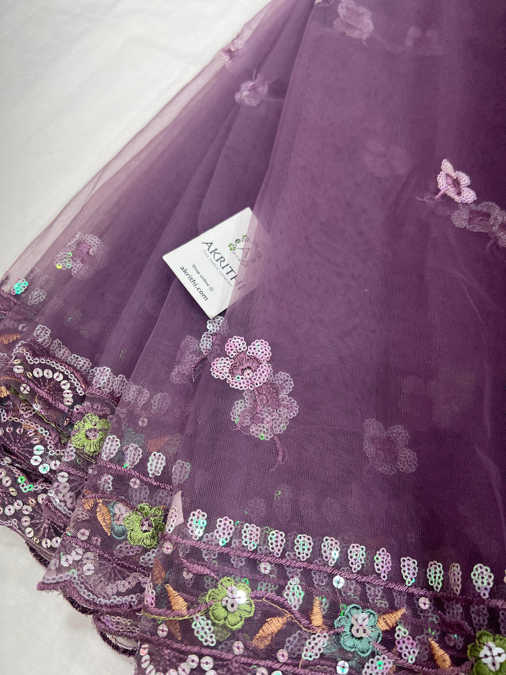 Embroidered net fabric