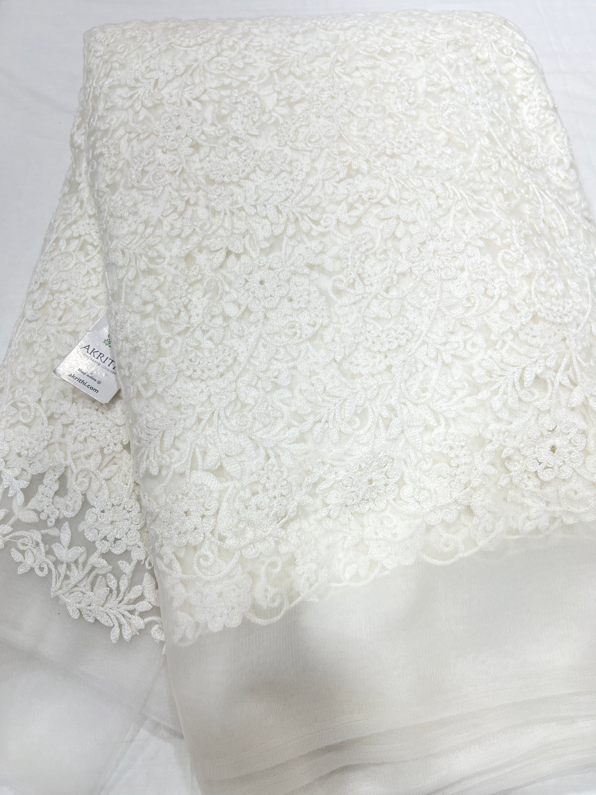 Embroidered net fabric