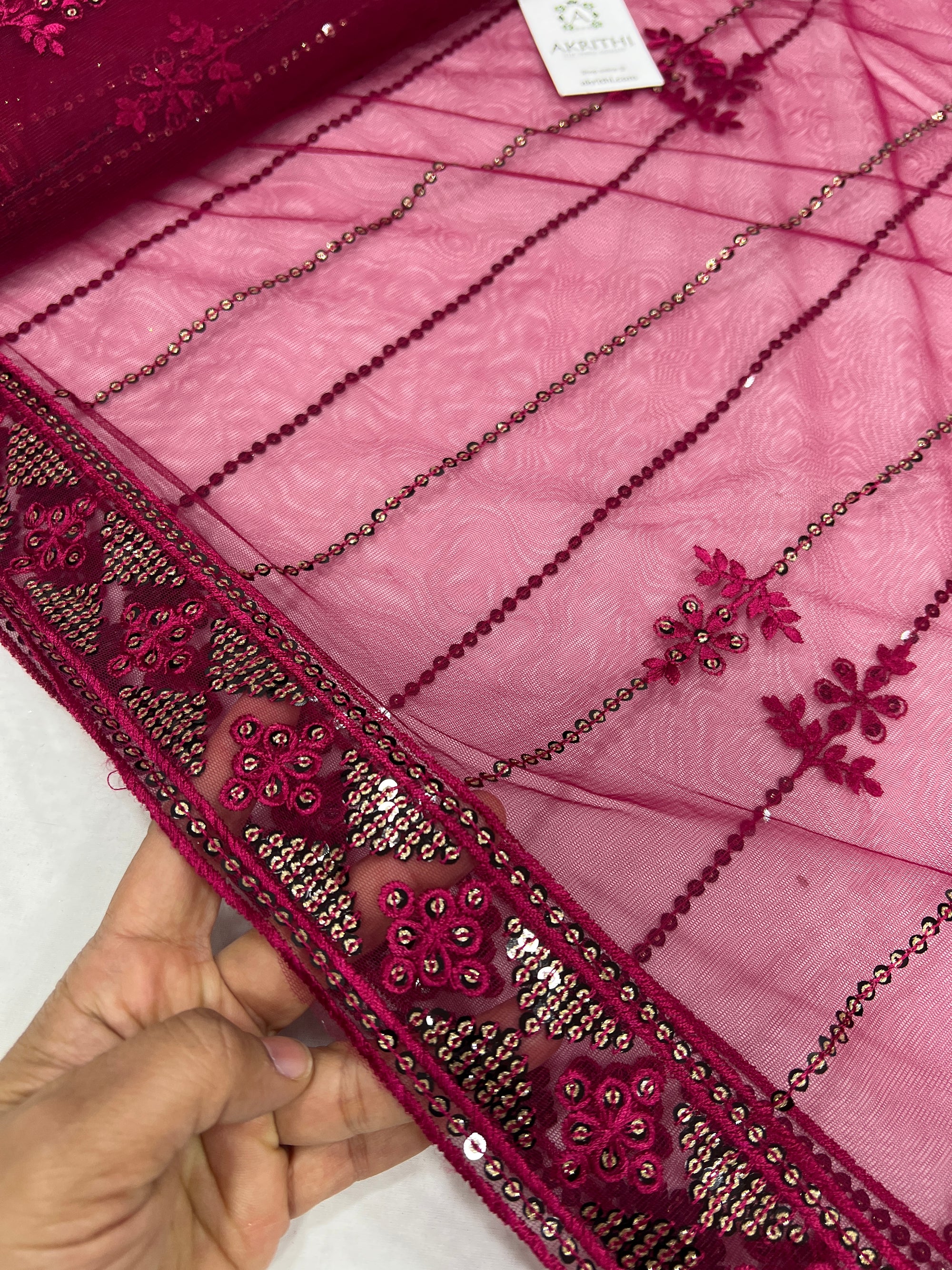 Embroidered net fabric
