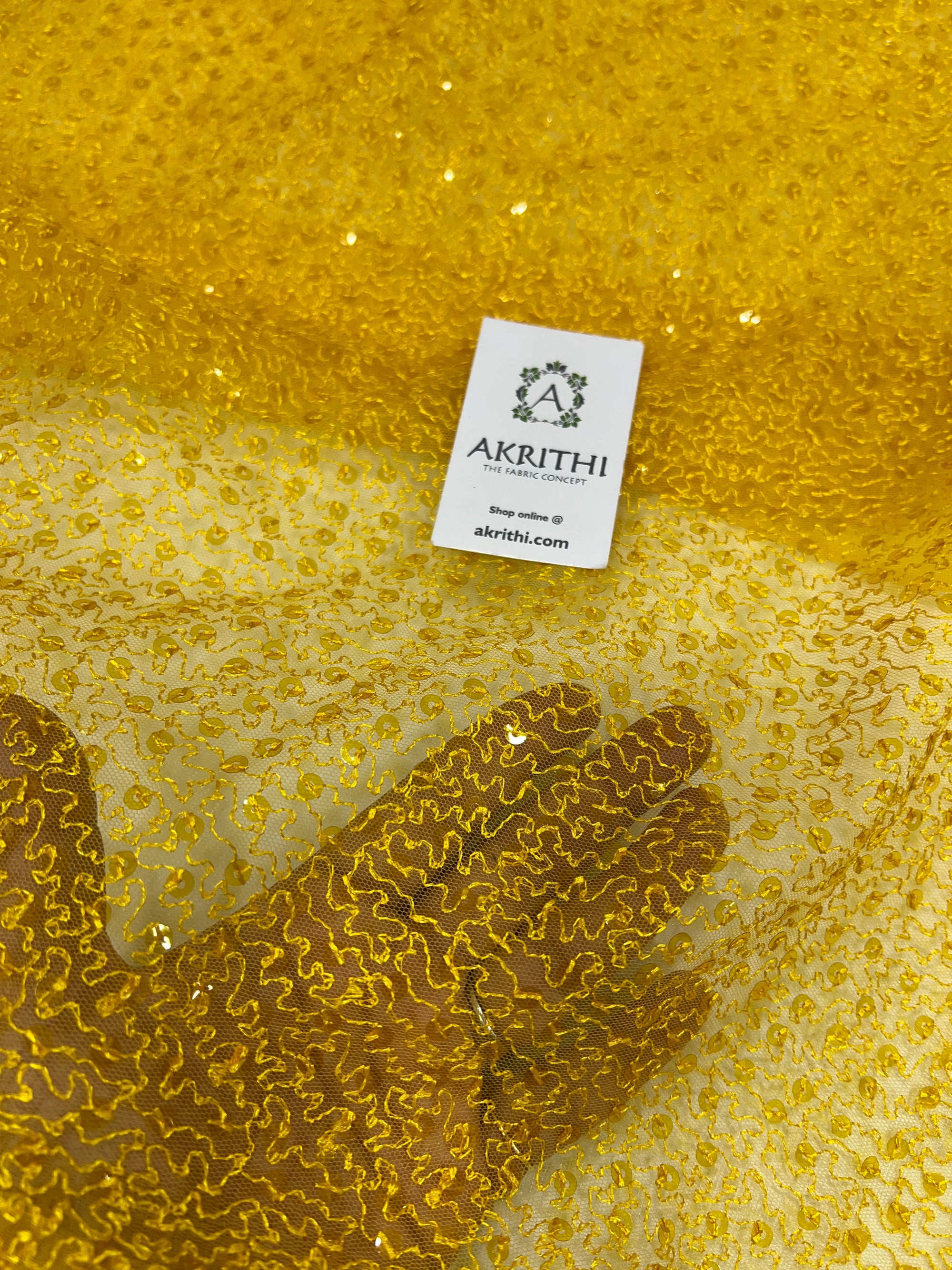 Self Embroidered net fabric