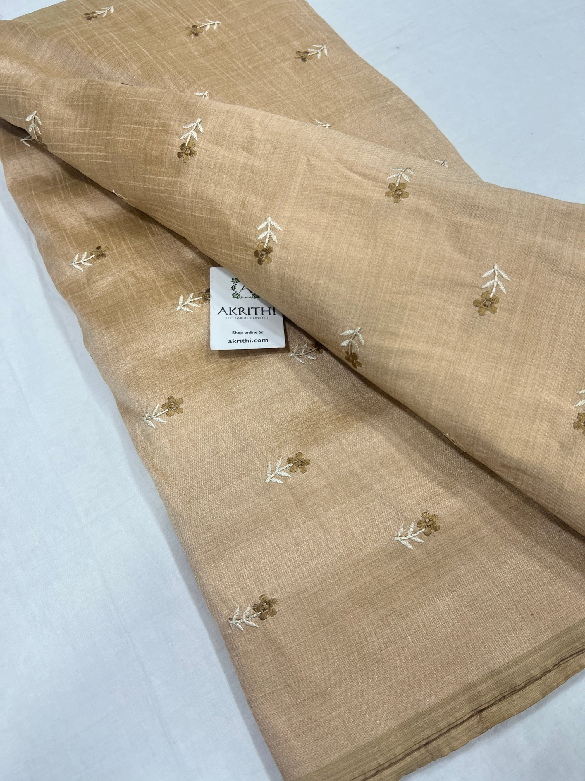 Embroidered raw silk fabric
