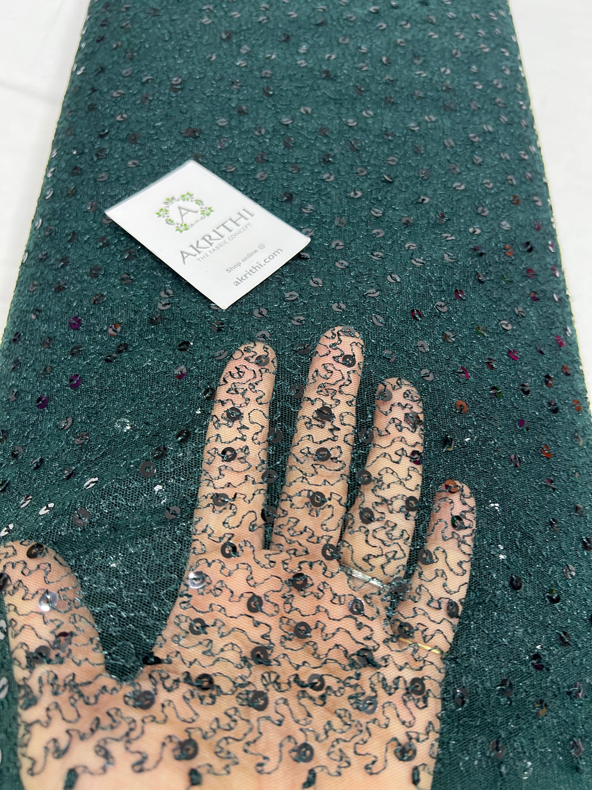 Self Embroidered net fabric