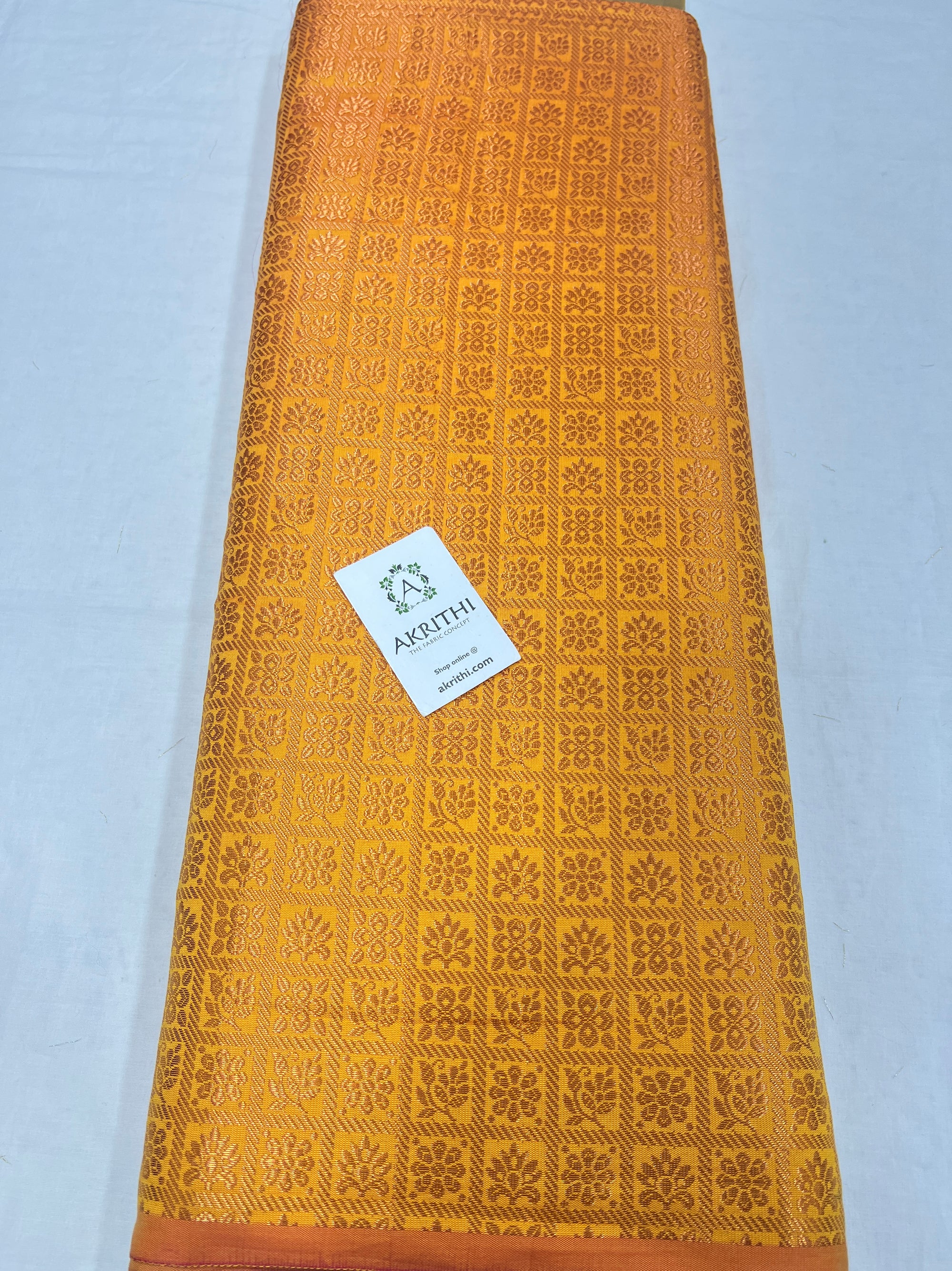 Banarasi brocade fabric with copper zari