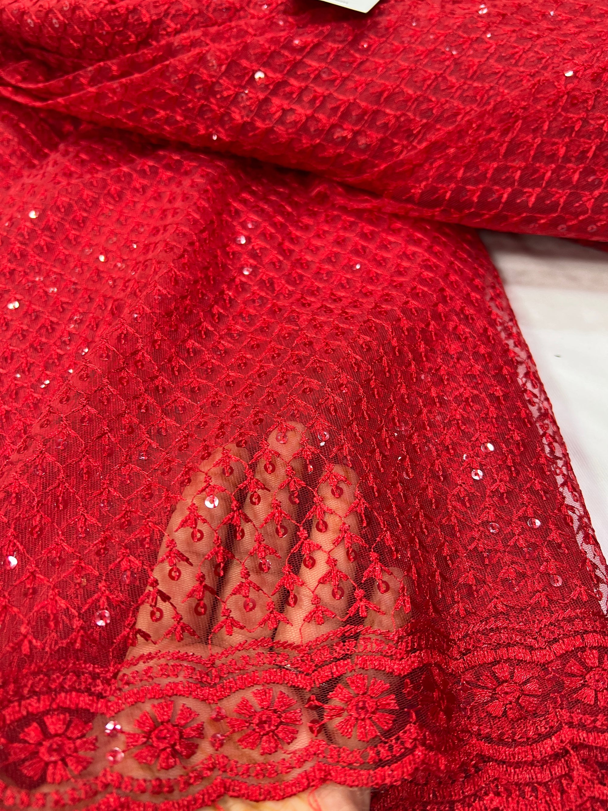 Embroidery on net fabric