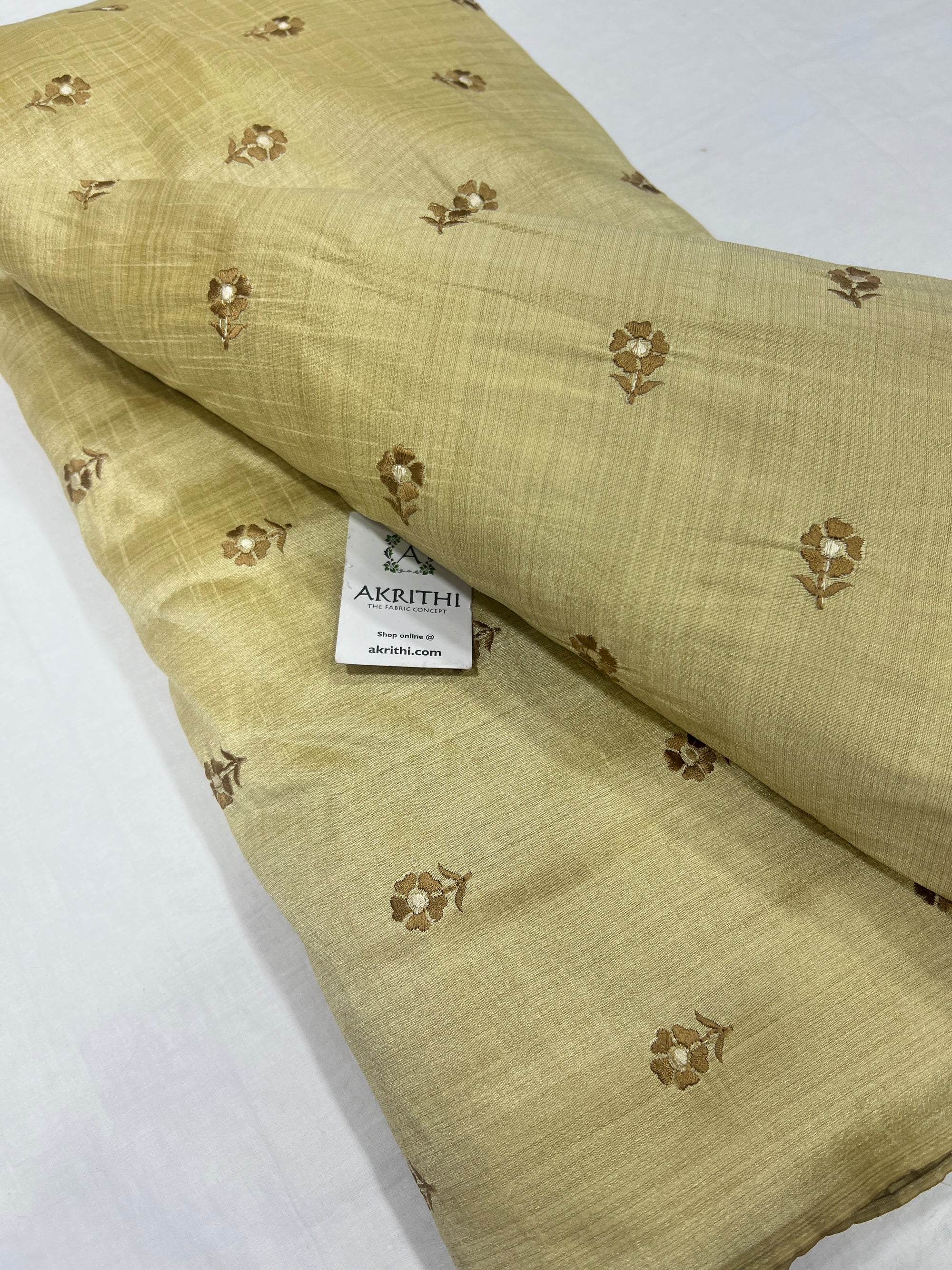 Embroidered raw silk fabric