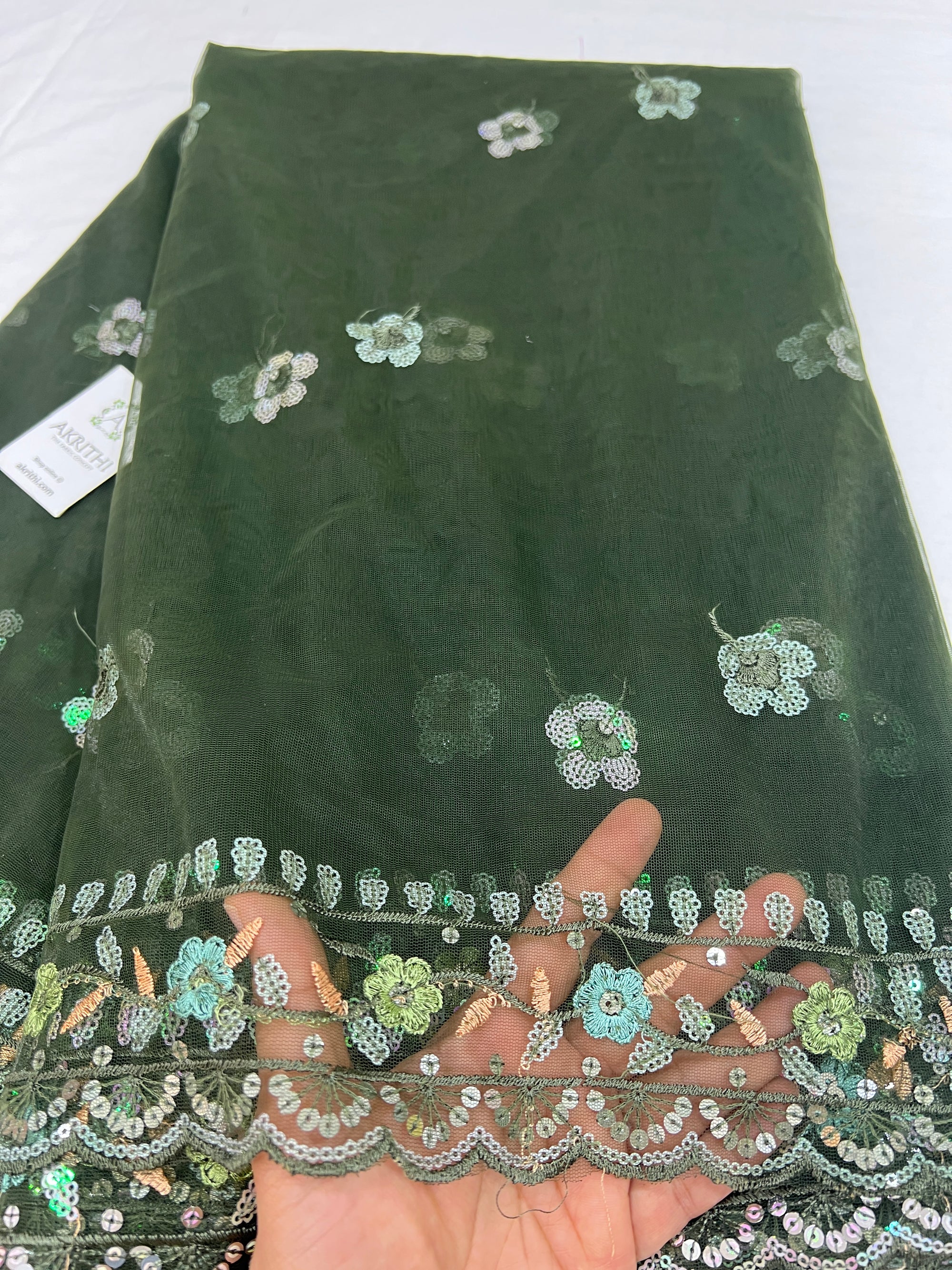 Embroidered net fabric