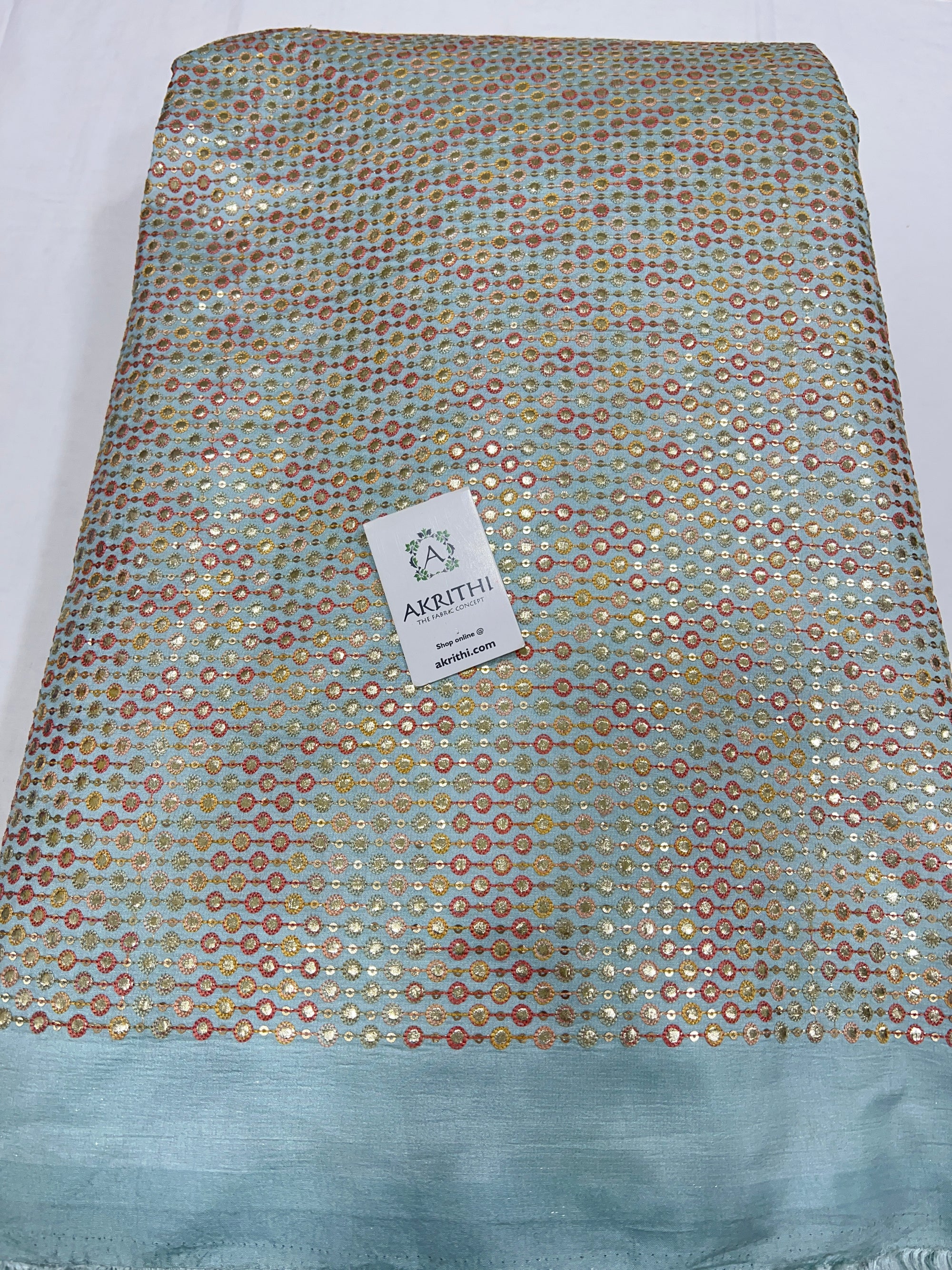 Heavy Embroidered on raw silk fabric