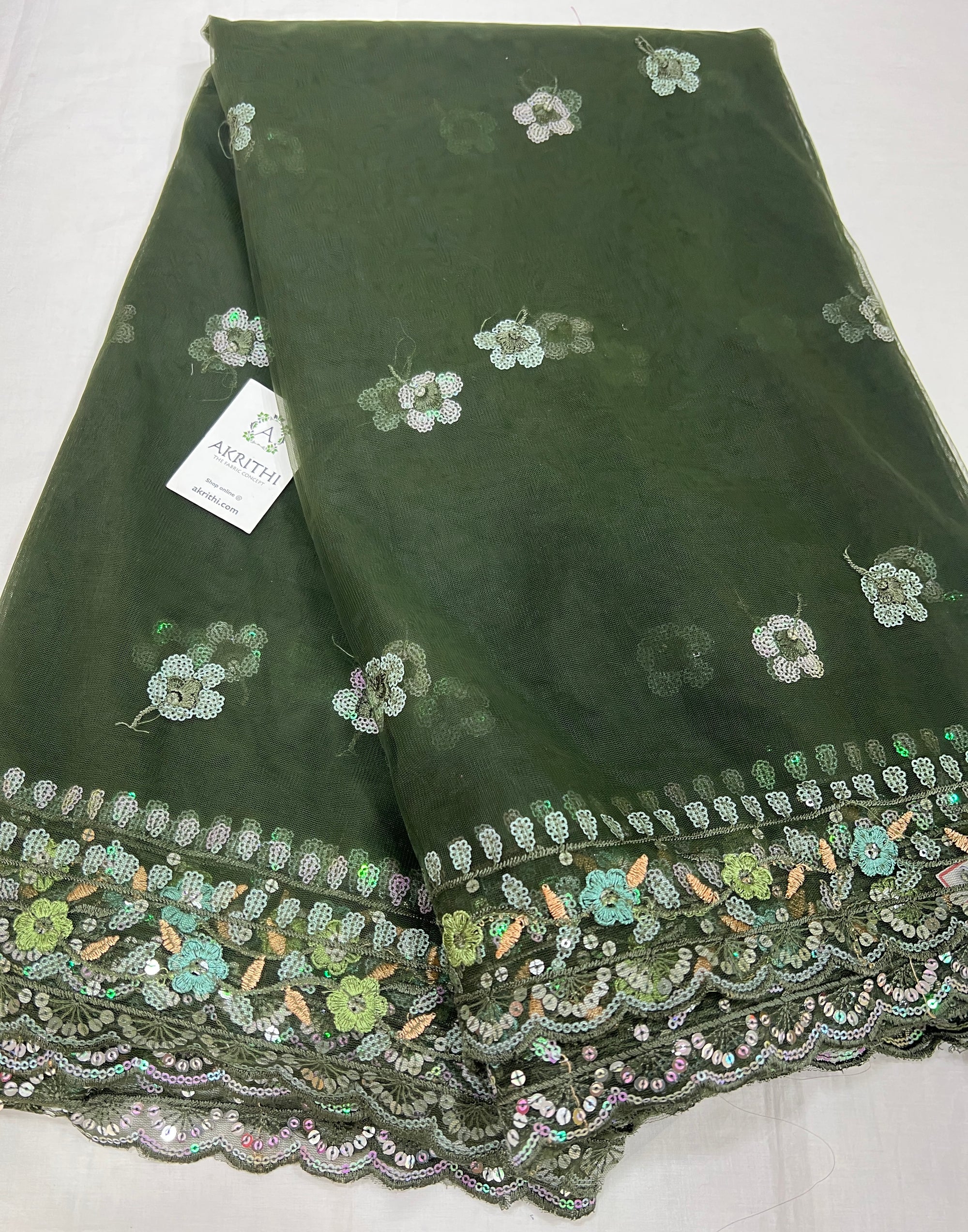 Embroidered net fabric