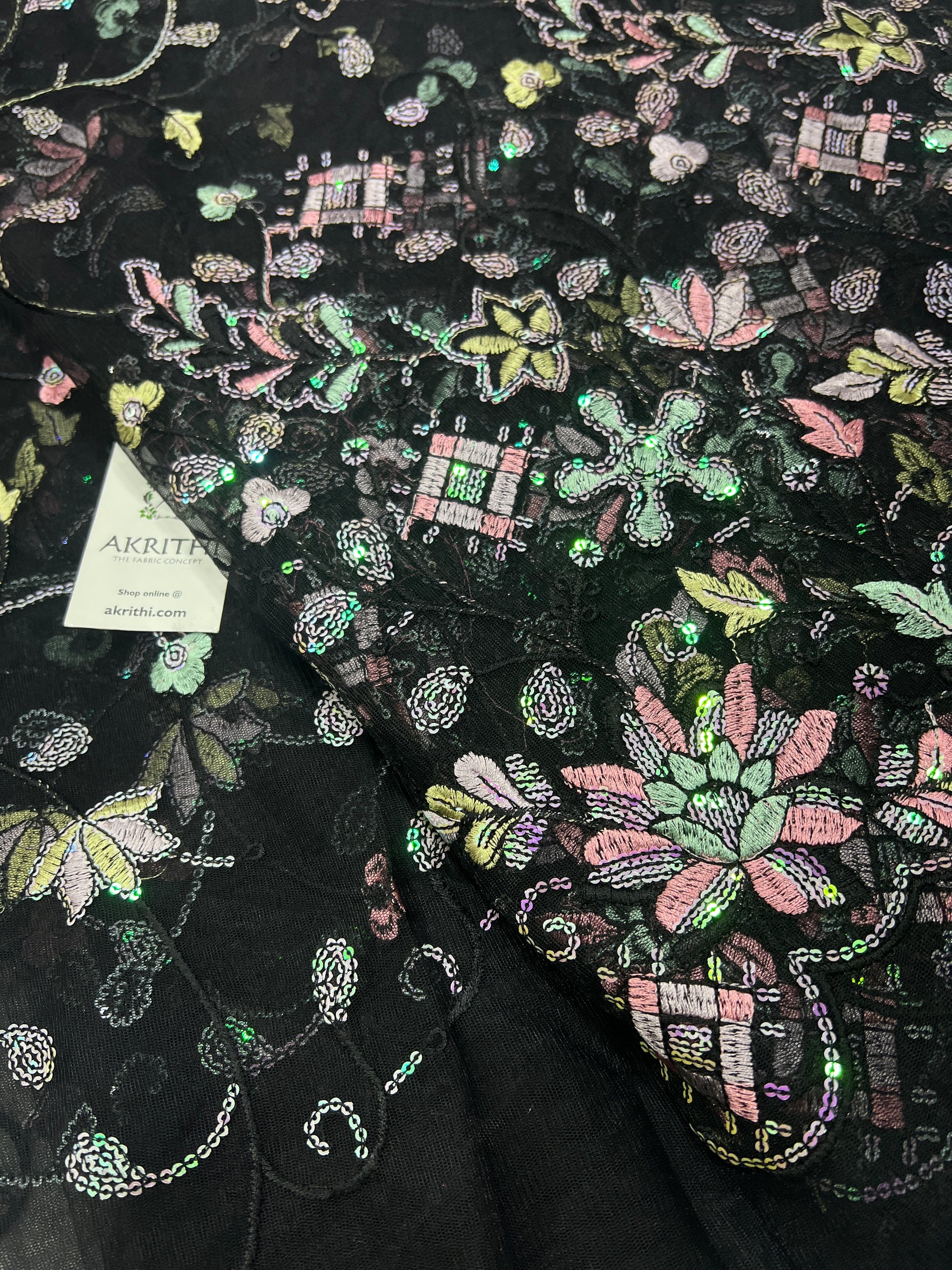 Embroidered net fabric