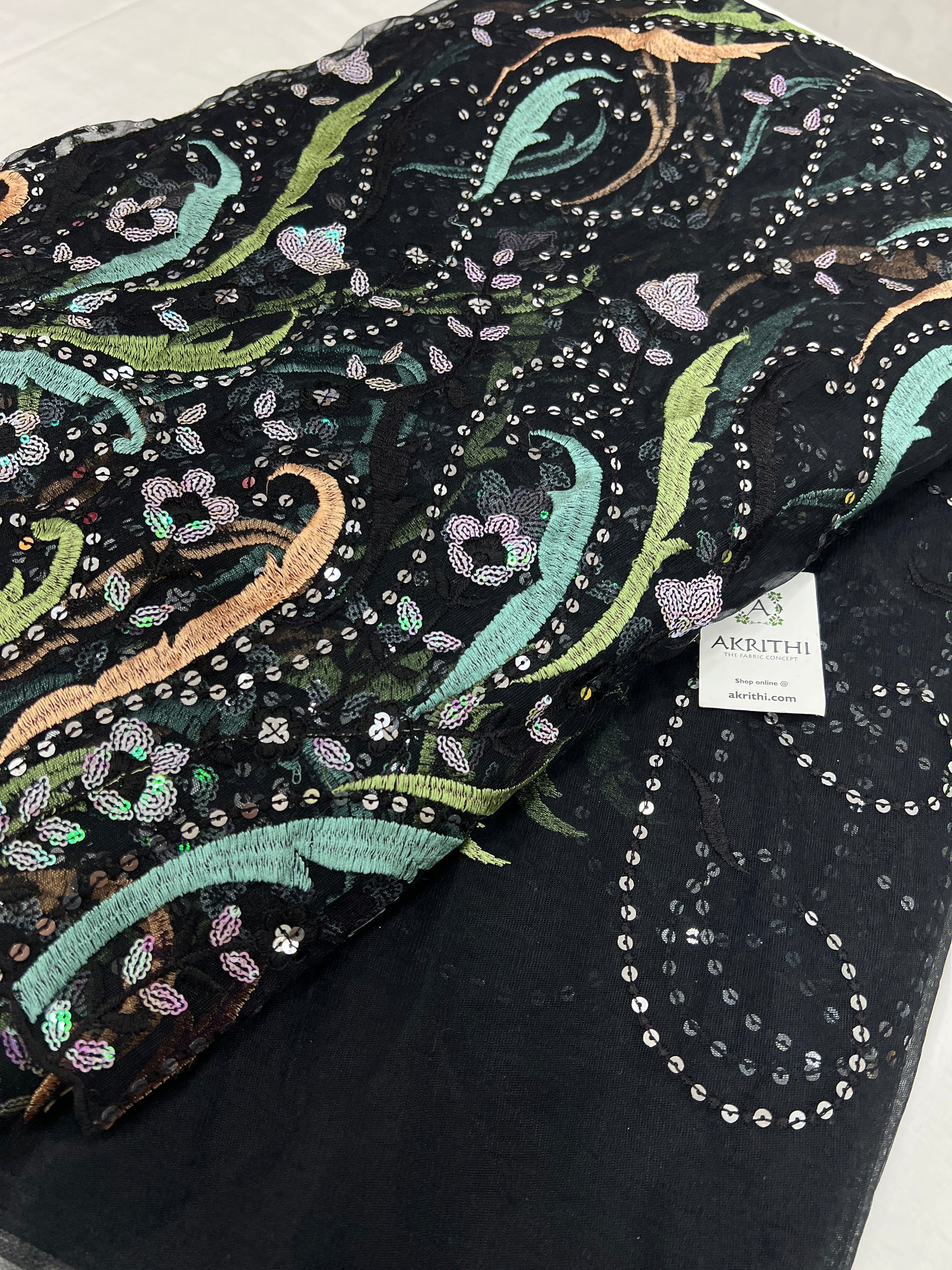 Embroidered net fabric