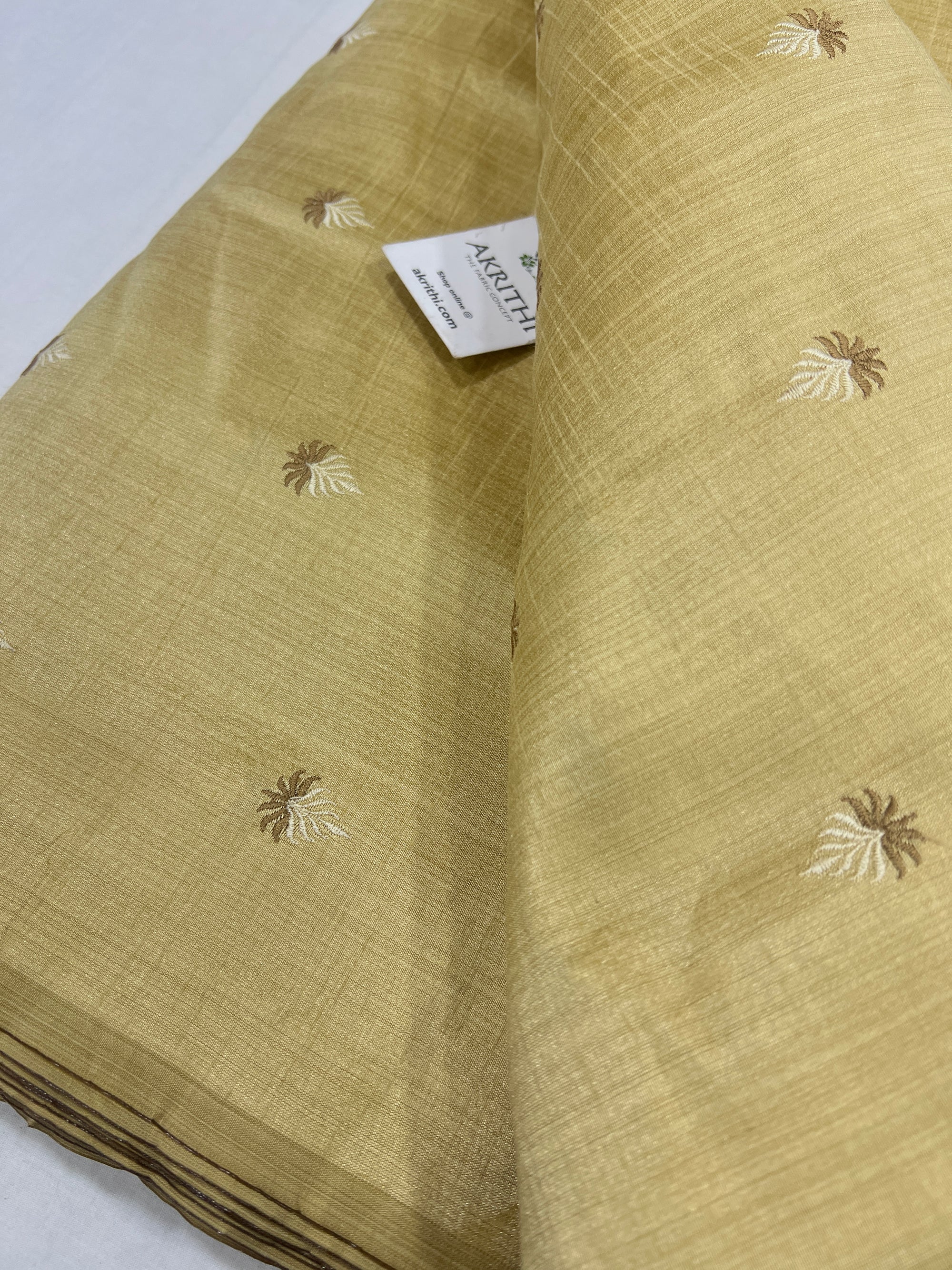 Embroidered raw silk fabric