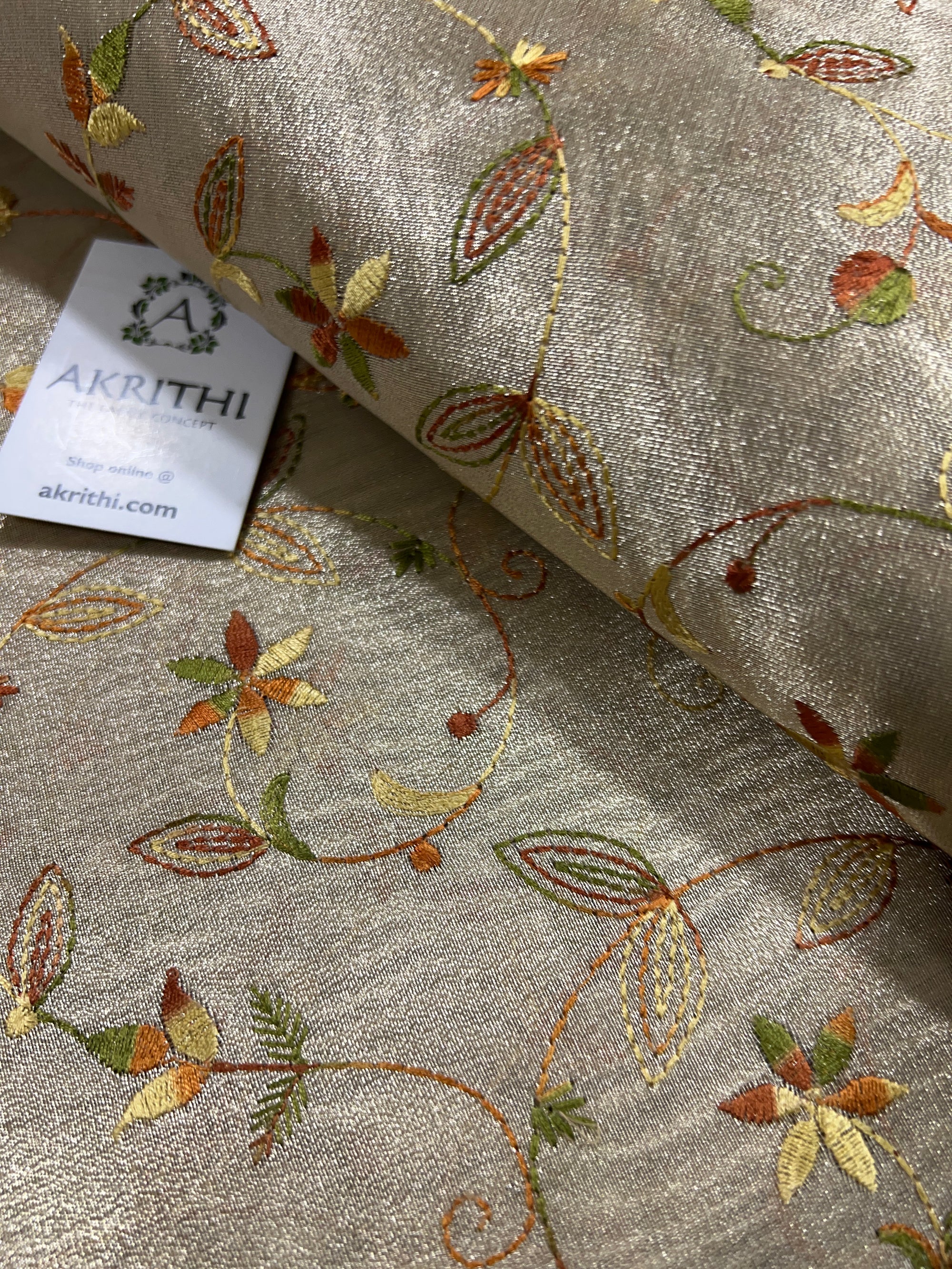 Embroidery on tissue fabric
