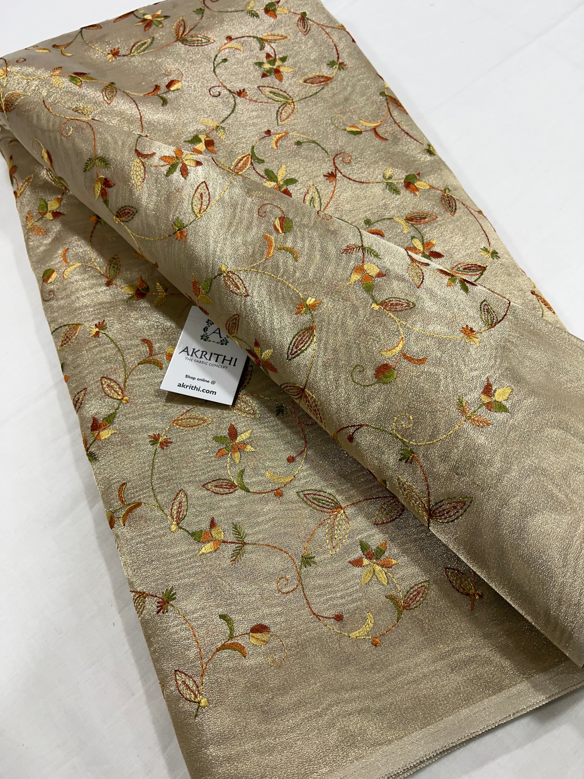 Embroidery on tissue fabric