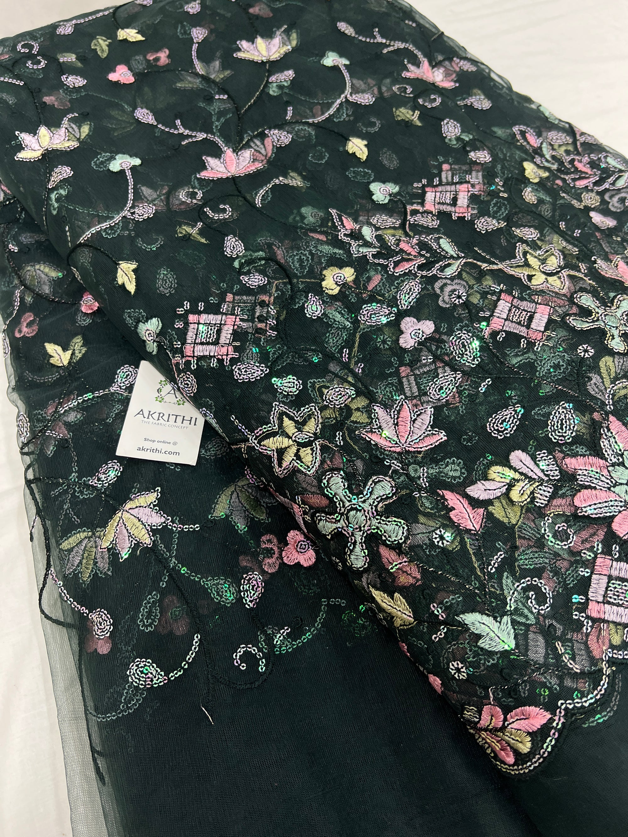 Embroidered net fabric