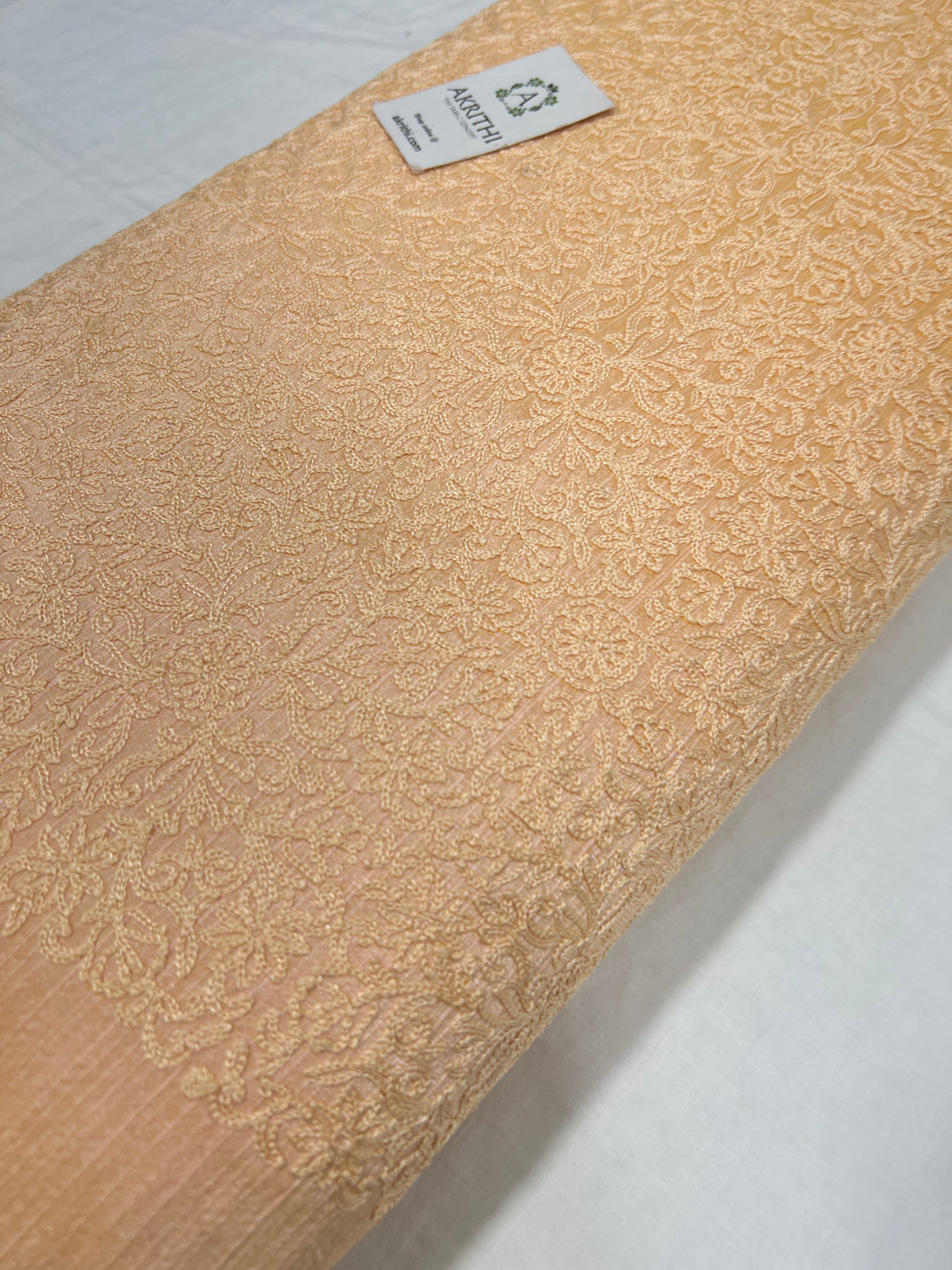 Embroidered raw silk fabric