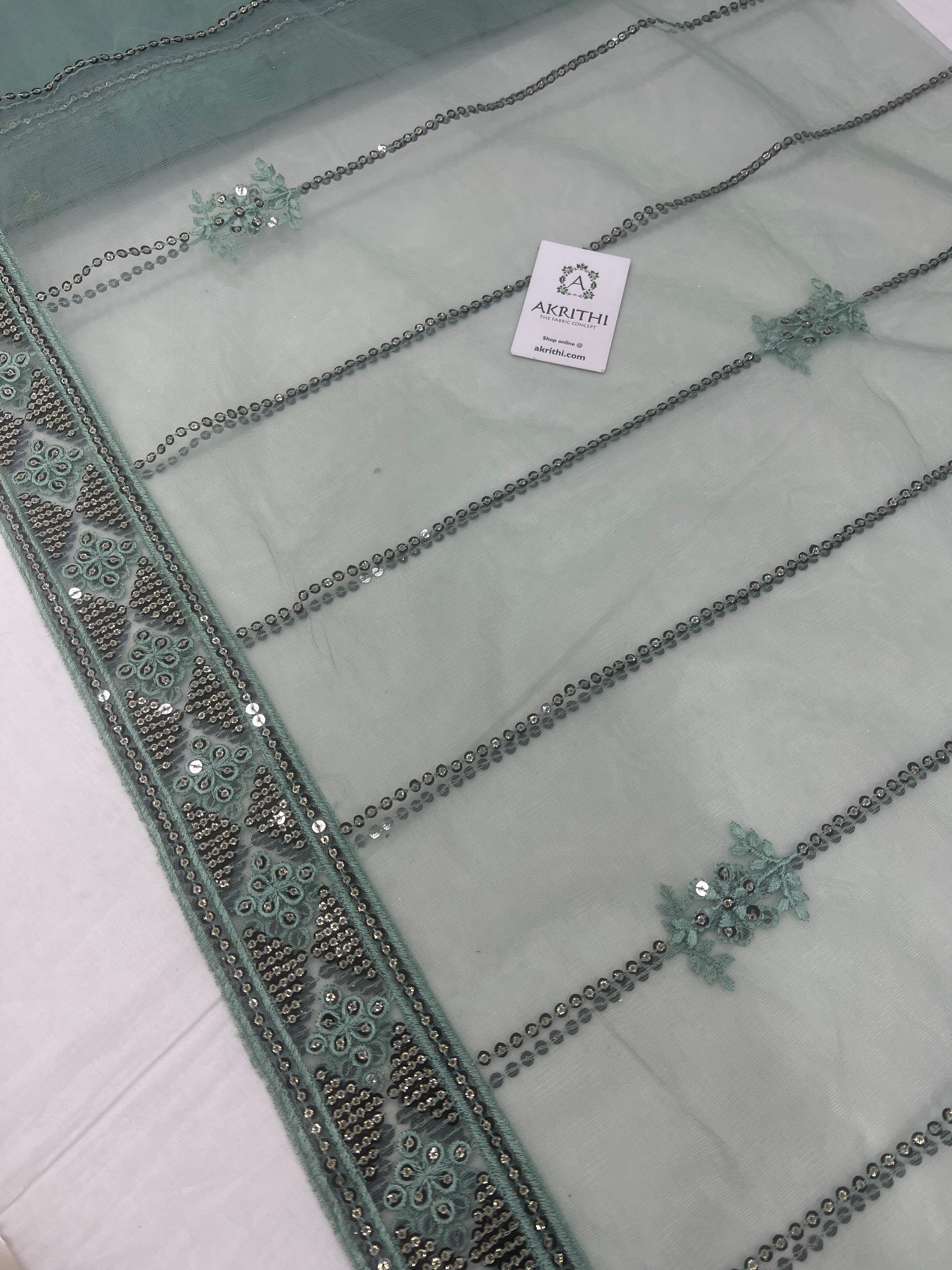 Embroidered net fabric